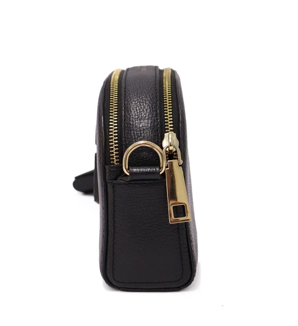 Marc by Marc Jacobs Shutter Crossbody Bag, dual compartment bag with leather Double-J Logo and an adjustable strap.

Material: Leather.
Hardware: Gold.
Height: 15cm
Width: 20cm
Depth: 7cm
Strap Total Length: 129cm
Overall condition: