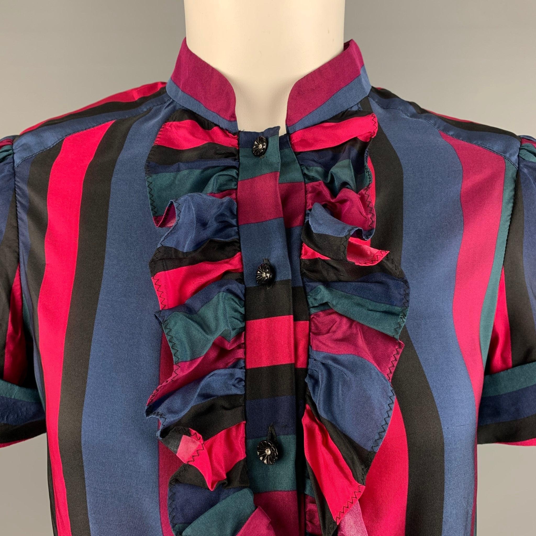 MARC by MARC JACOBS short sleeve shirt in a multi-color rayon silk blend fabric featuring ruffle front, stripe pattern, cuffed short sleeves, flower button detailing, and a button closure. Good Pre-Owned Condition. Moderate signs of wear. As-Is.