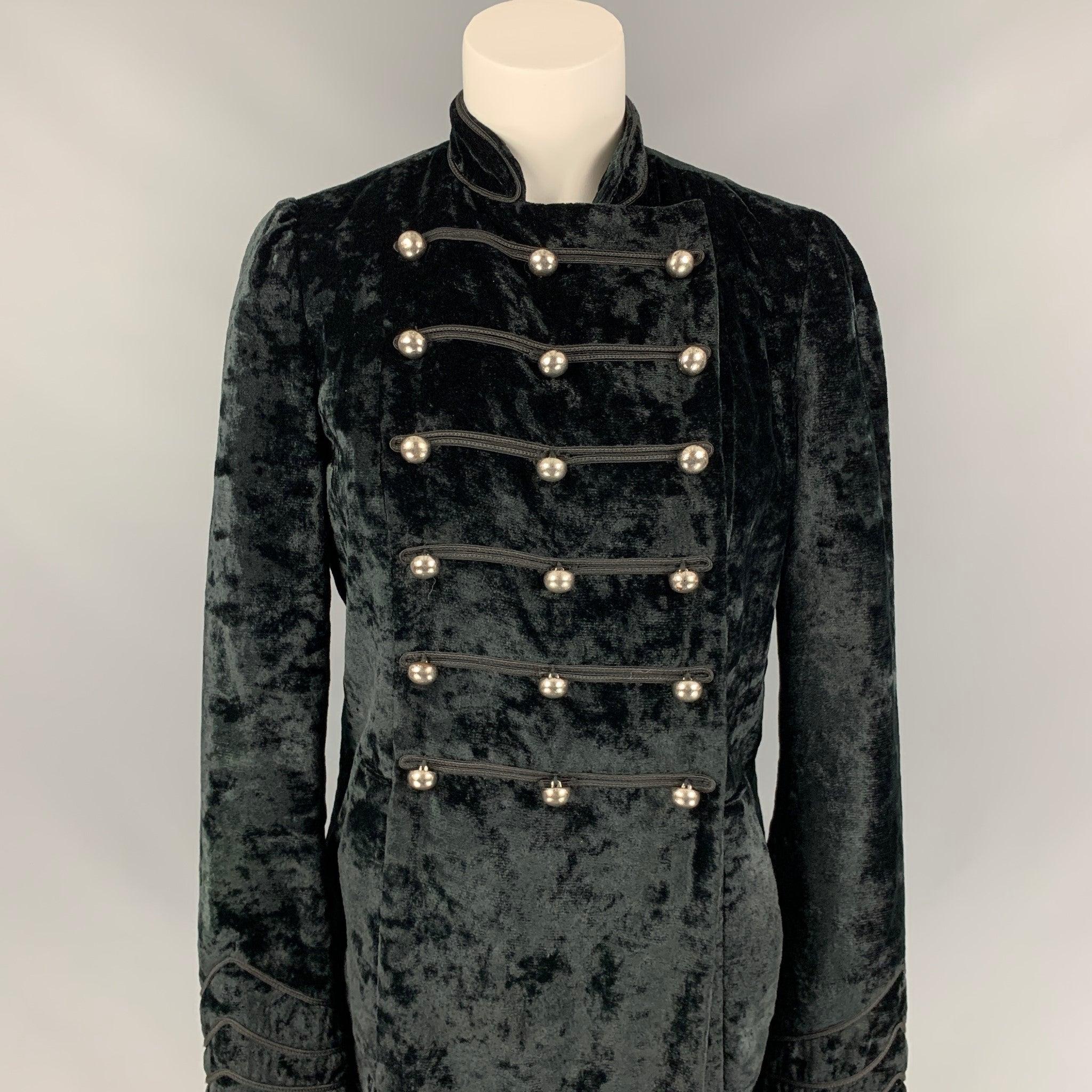 MARC by MARC JACOBS coat comes in a black velvet rayon / polyester featuring a stand up collar, back strap, silver tone metal buttons, slit pockets, and a double breasted closure.
Very Good
Pre-Owned Condition. 

Marked:  M 

Measurements: 
