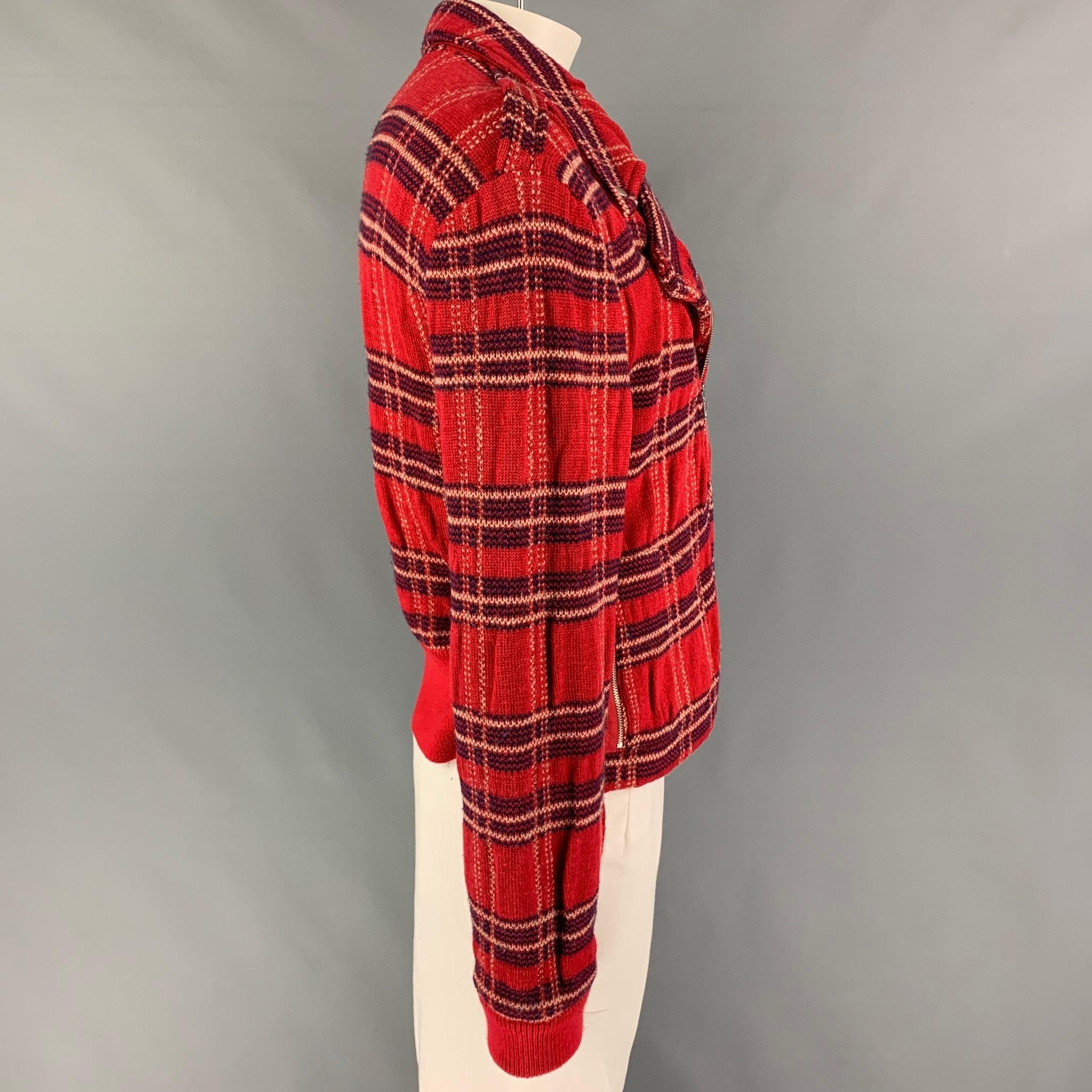 MARC by MARC JACOBS jacket comes in a red & navy knitted plaid wool featuring a biker style, zipper pockets, silver tone hardware, and a zip up closure.
Very Good
Pre-Owned Condition. 

Marked:   XL  

Measurements: 
 
Shoulder: 22 inches  Chest: 44