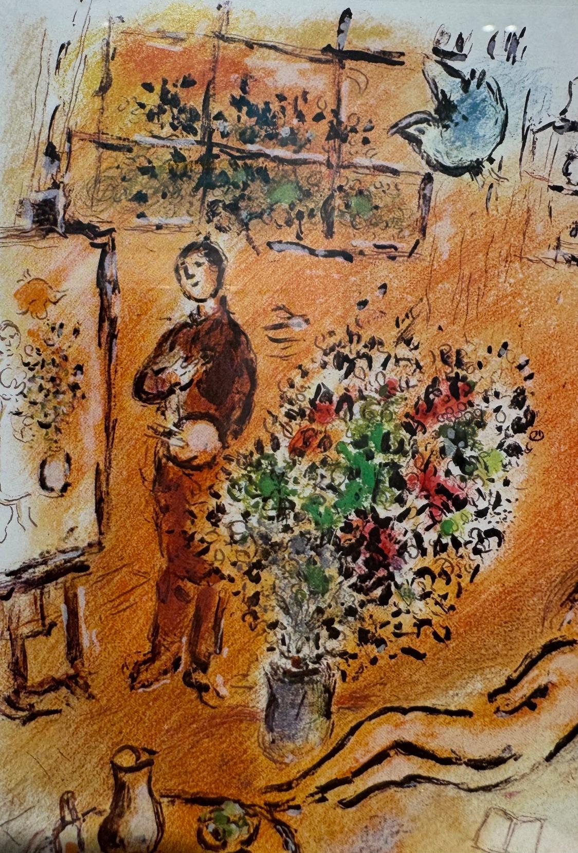 Le studio baigné de soleil - Chagall color lithograph of his studio in sunlight - Brown Figurative Print by Marc Chagall