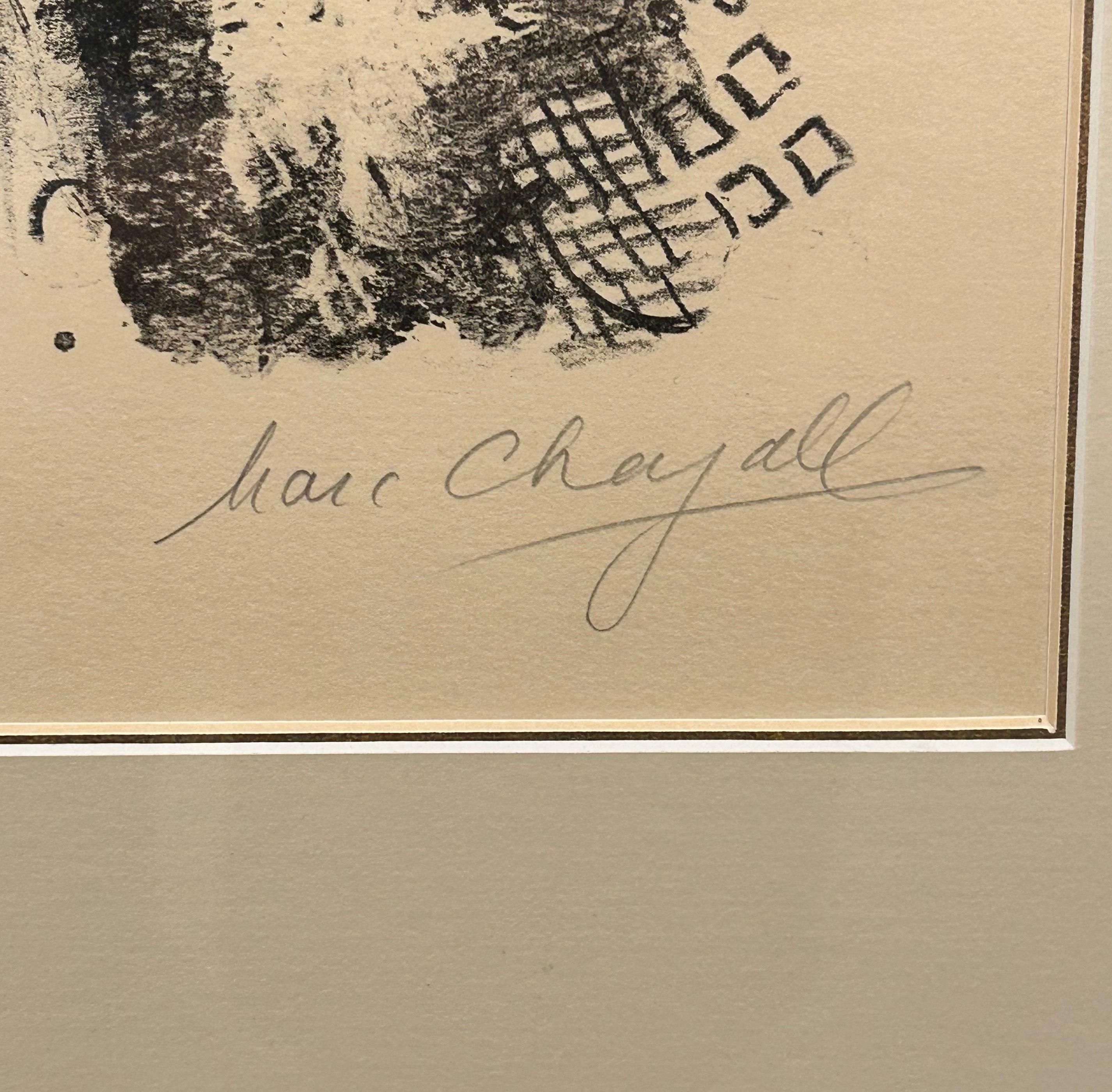 Couple a l’Oiseau (Couple with a Bird). Black and white lithograph on Arches paper created in 1959 by Marc Chagall, printed by Mourlot in Paris. Signed and numbered in pencil by the artist, edition 22/40. Image features a woman with a man behind