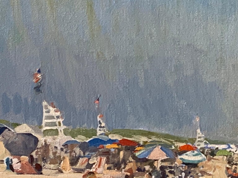 Painted en plein air, in Amagansett, New York. Indian Wells Beach is a bustling shoreline in East Hampton. Figure rest under umbrellas, and on towels, on this vast expanse of sand. A lifeguard stand sits tall in the distance amongst the crowd.