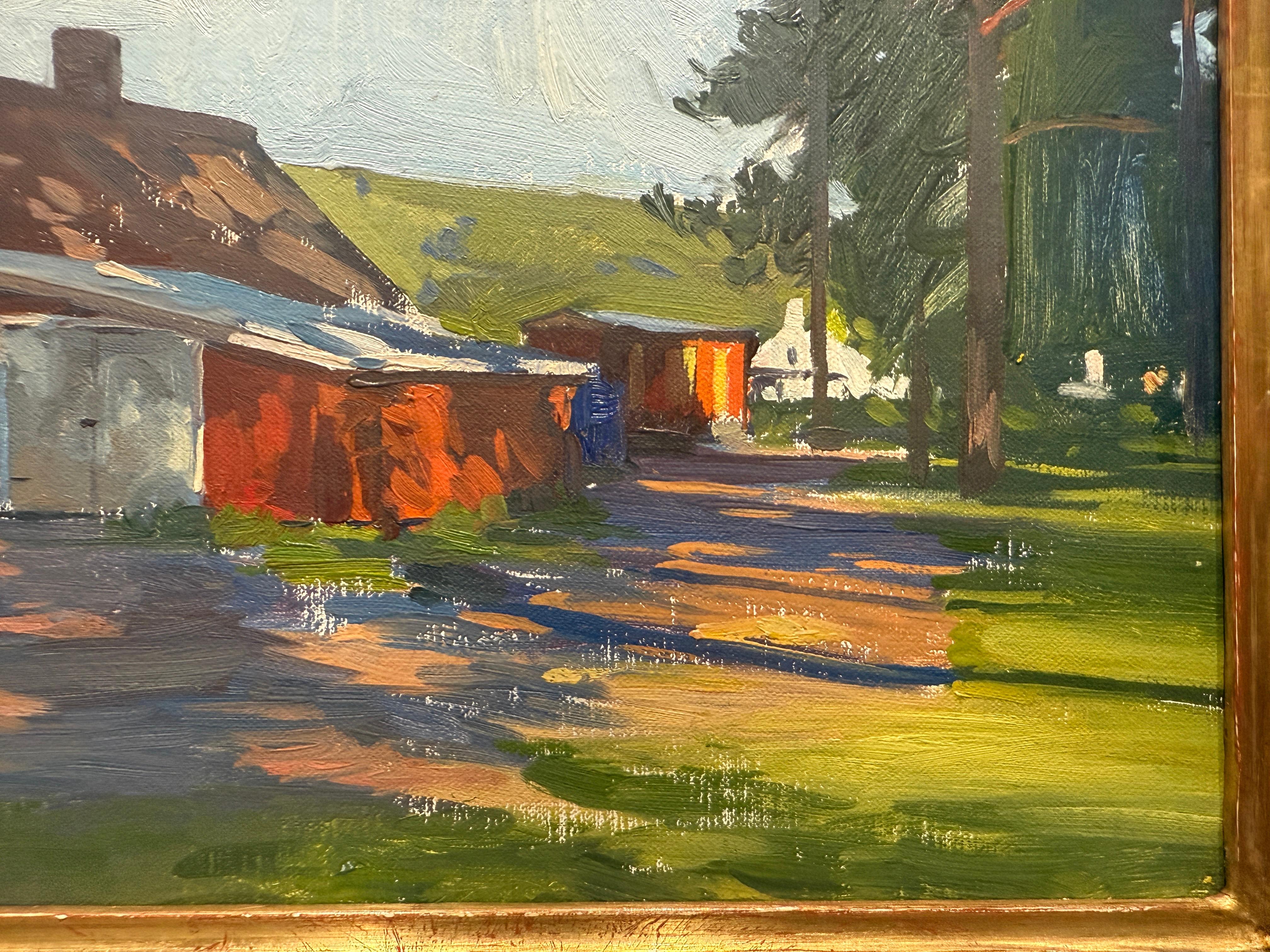 Painted en plein air in Rattvik, Sweden, a red barn stands amidst a dirt road. This shaded dirt road is depicted not with many shades or brown, rather many shades of blue. A bright green hillside beyond the barn marks the horizon. Tall pine trees
