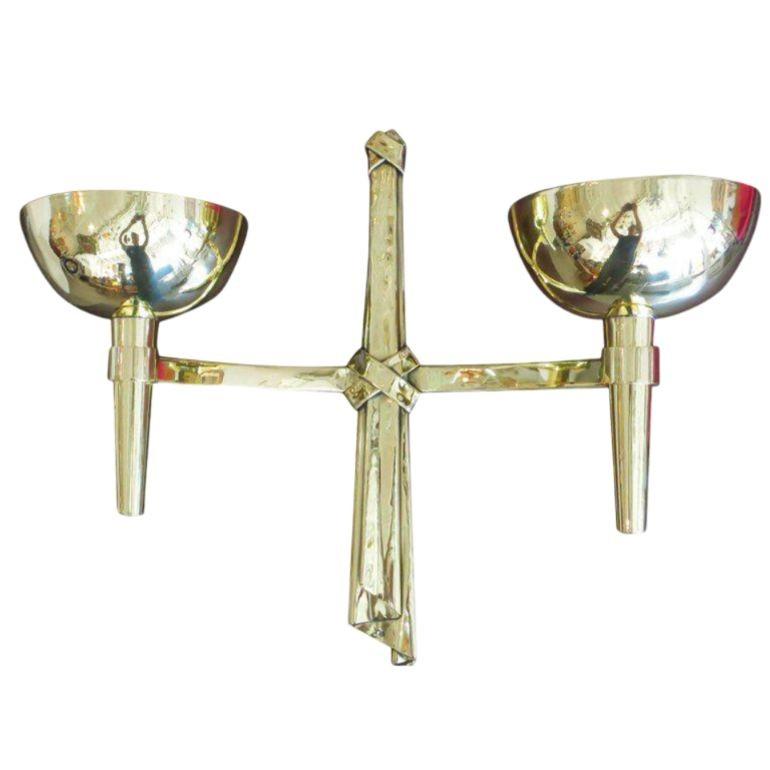 Pair of Neo-antique wall lamps in metal and wrought iron gilded with gold leaf. This model was designed for the salon de couture of Jacques Heim, avenue des Champs-Elysées, Paris, Circa 1938.

3 Pairs are available

Condition: EXCELLENT
Materials /