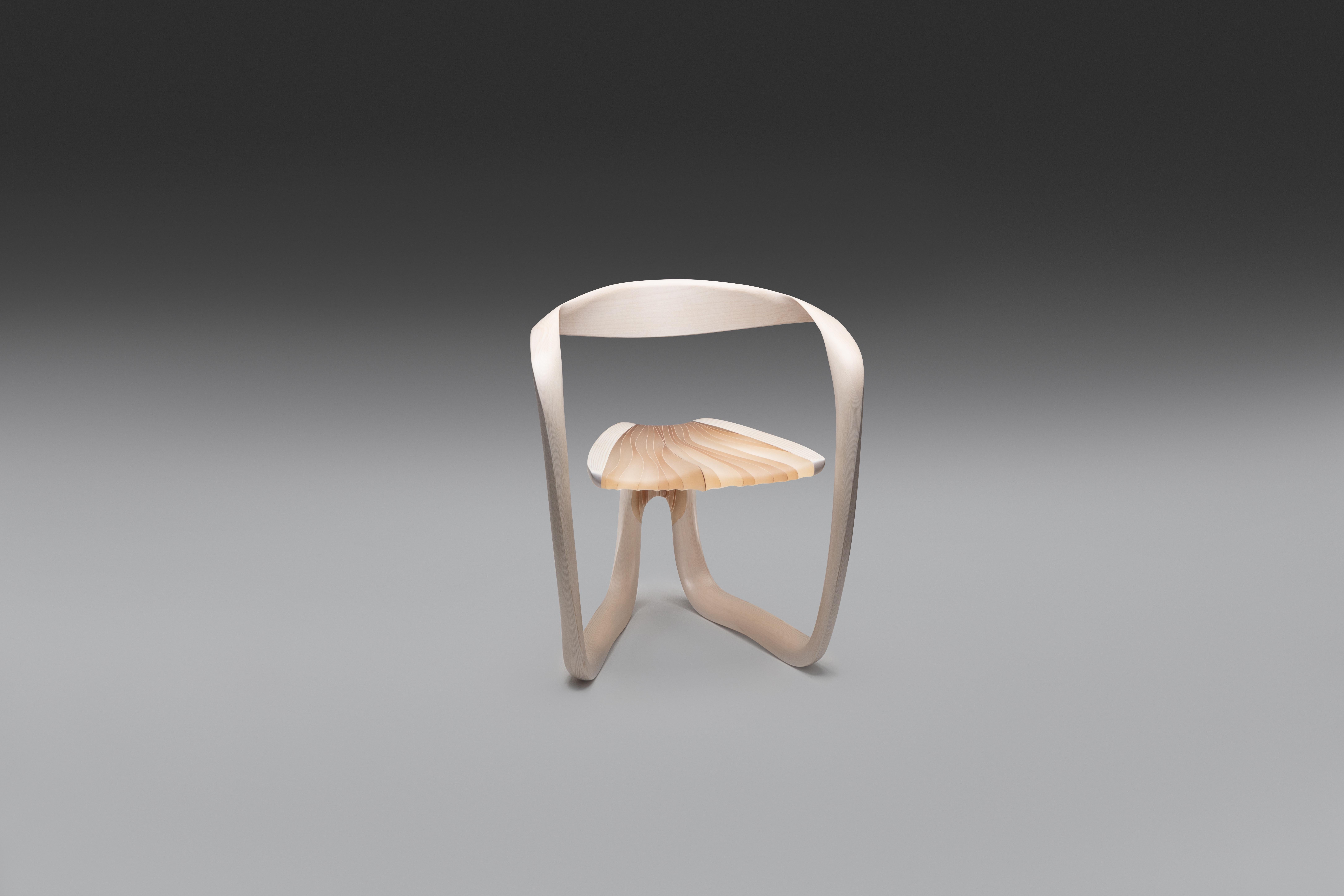 The Ethereal furniture is made from Marc Fish's usual laminated veneer technique, with the important difference that he leaves negative space between them – treating them not as layers within a solid stratigraphy, but as fins within a more open