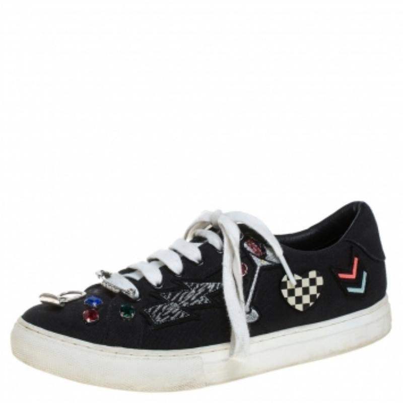 These Marc Jacobs sneakers are simple yet stylish. They've been crafted from monogram canvas and designed with laces, patches, and embellishments. These low-top sneakers are just perfect to ace one's casual style.