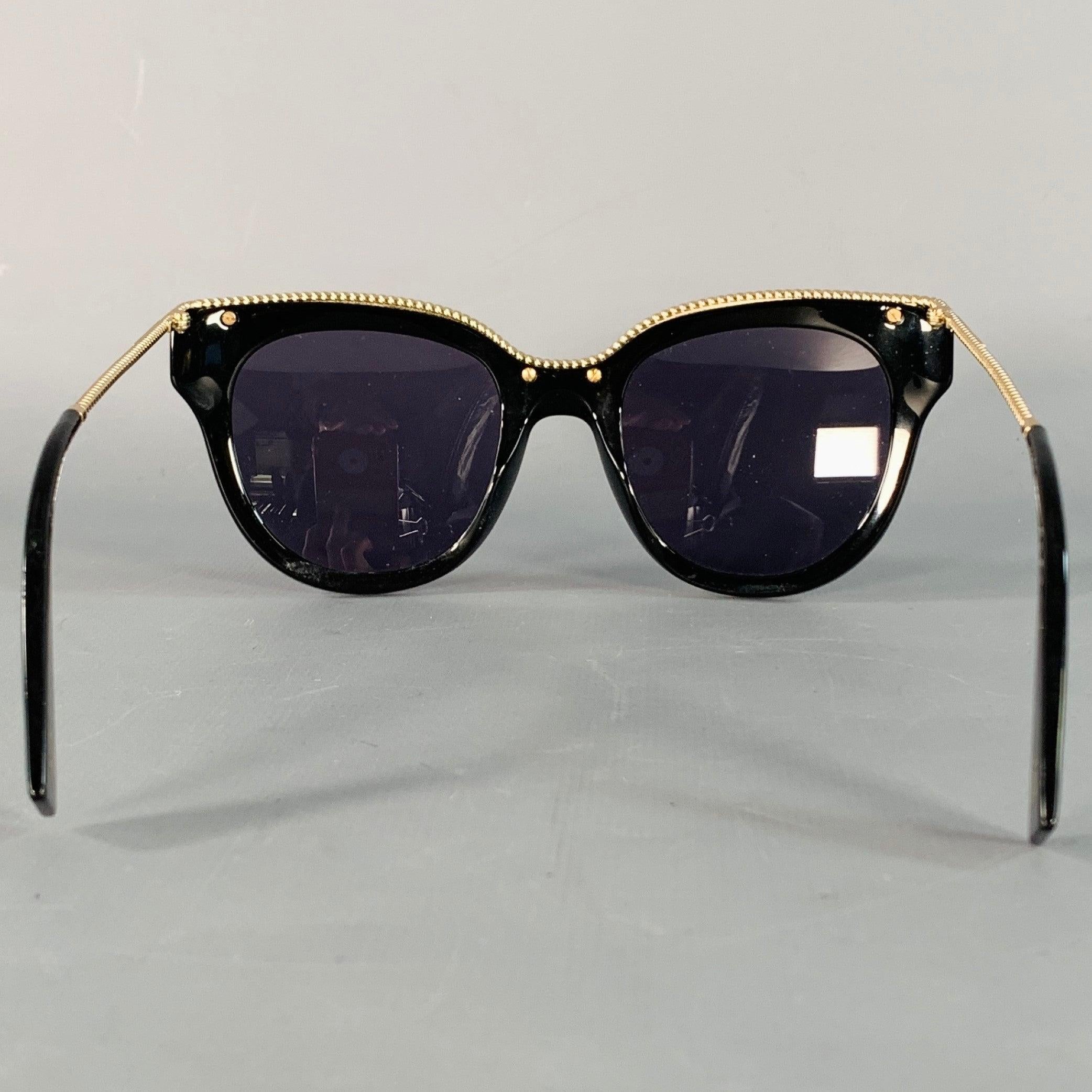 Nero MARC JACOBS Occhiali da sole rotondi oversize in metallo acetato oro nero in vendita
