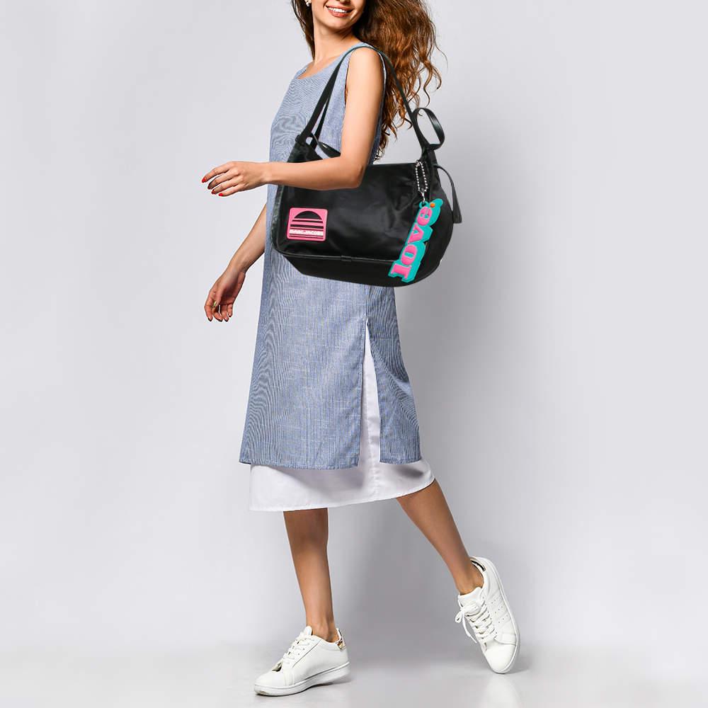This alluring tote bag for women has been designed to assist you on any day. Convenient to carry and fashionably designed  the tote is cut with skill and sewn into a great shape. It is well equipped to be a reliable accessory.