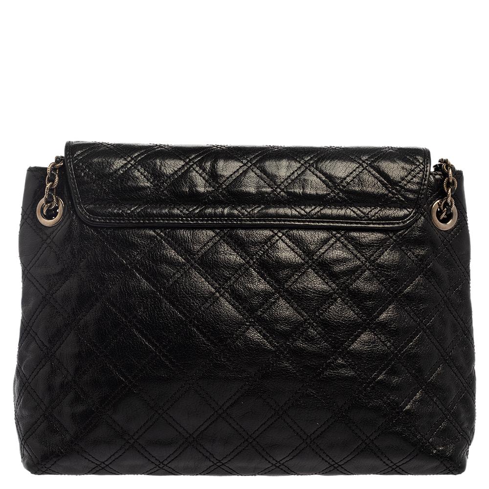 The house of Marc Jacobs has exclusively created this elegant piece in a subtle shade of black, just for you. Crafted from quilted leather, this Baroque bag comes with a canvas interior to keep your valuables organized. This gorgeous piece features