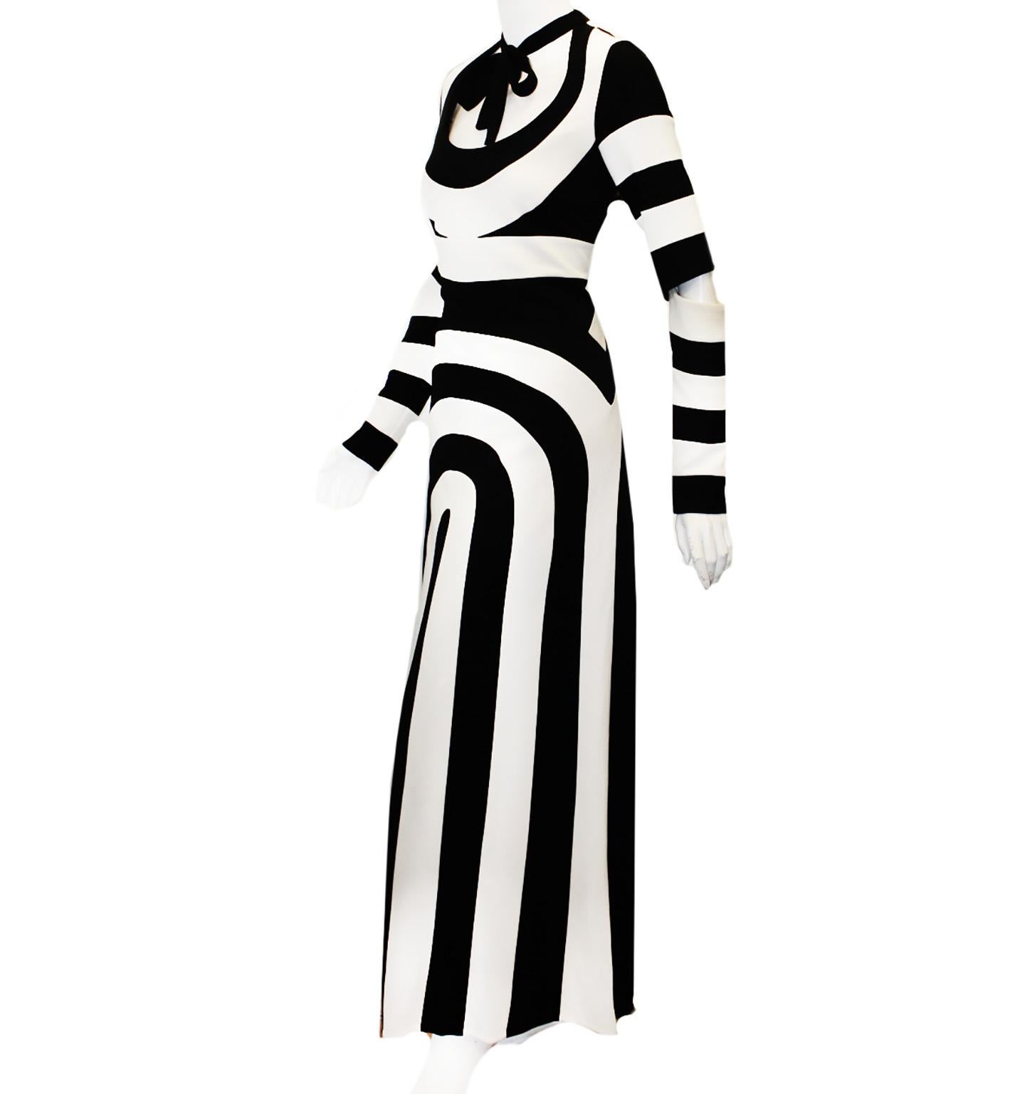 Marc Jacobs Spring 2013 collection at New York's Fashion Week was set up to be an optical illusion with the swingin' 60's vibe.  All garments were inspired by and reminiscent of the 1960's in London.  This evening dress is a classic replica of the