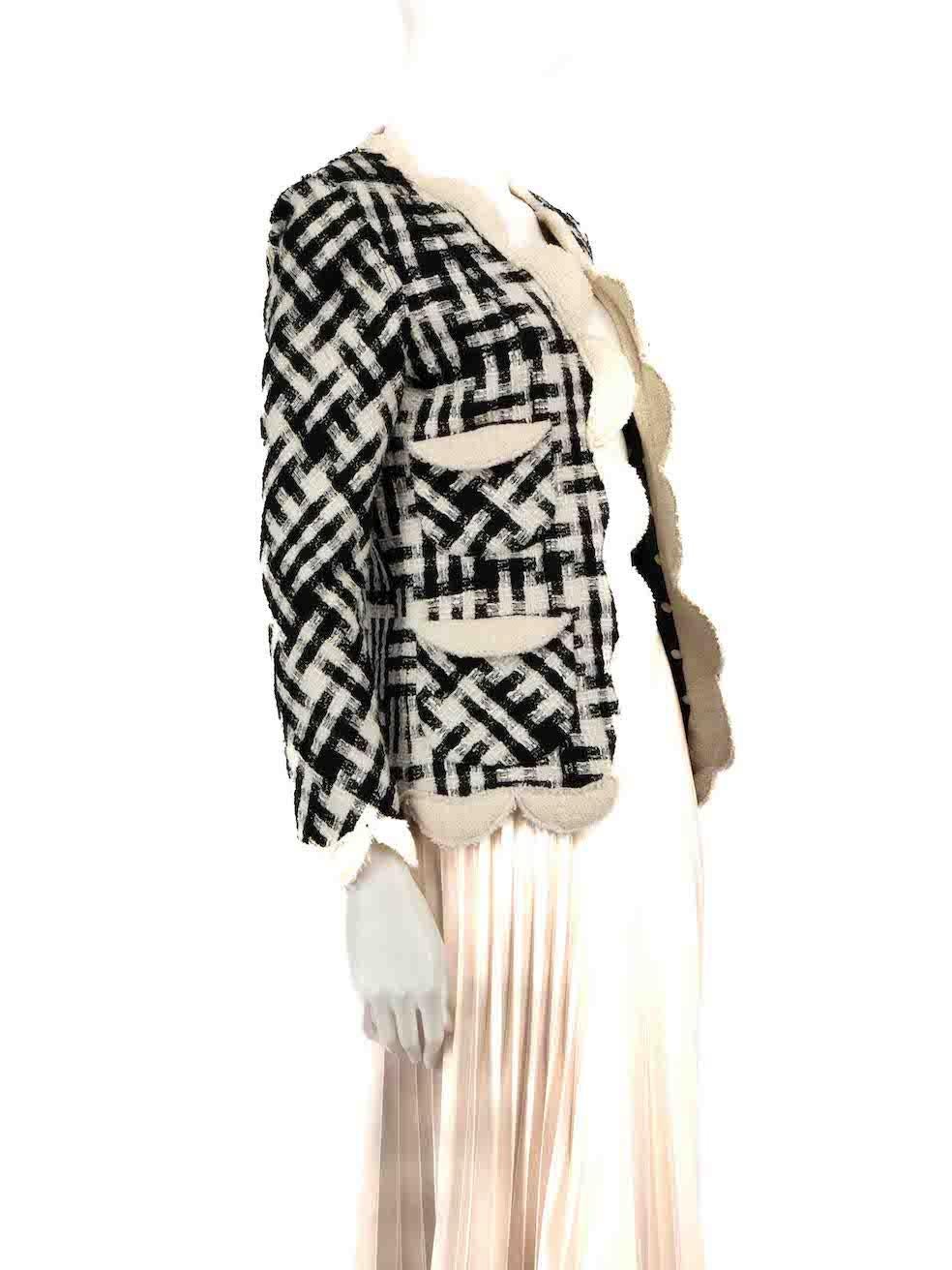 CONDITION is Very good. Hardly any visible wear to jacket is evident on this used Marc Jacobs designer resale item.
 
 
 
 Details
 
 
 Black and white
 
 Wool
 
 Jacket
 
 Checkered pattern
 
 Scalloped edge
 
 Open front
 
 4x Front pockets
 
 
 
