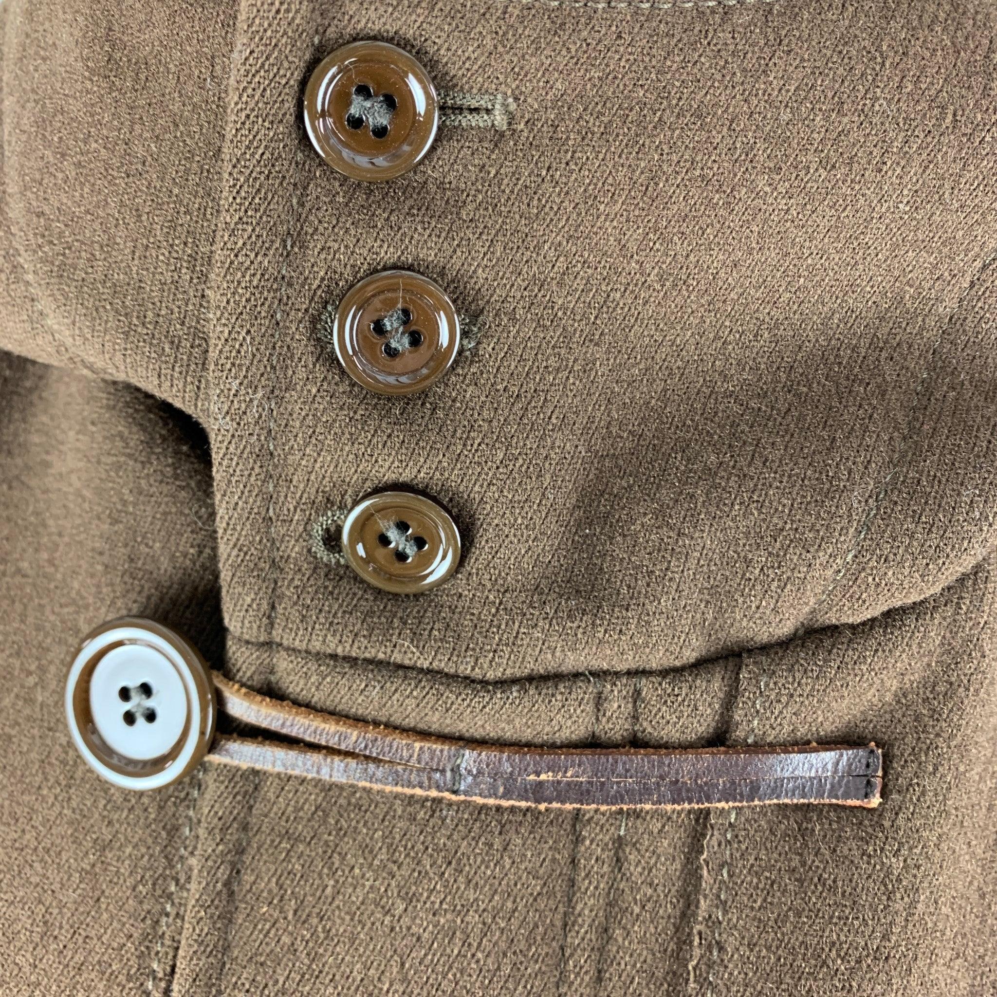 MARC JACOBS brown hooded coat comes in 100% wool featuring wide welt pockets and leather loops for button closure. Made in Italy.Very Good Pre-Owned Condition. 

Marked:  42 

Measurements: 
 
Shoulder: 19 inches Chest: 46 inches Sleeve: 26 inches