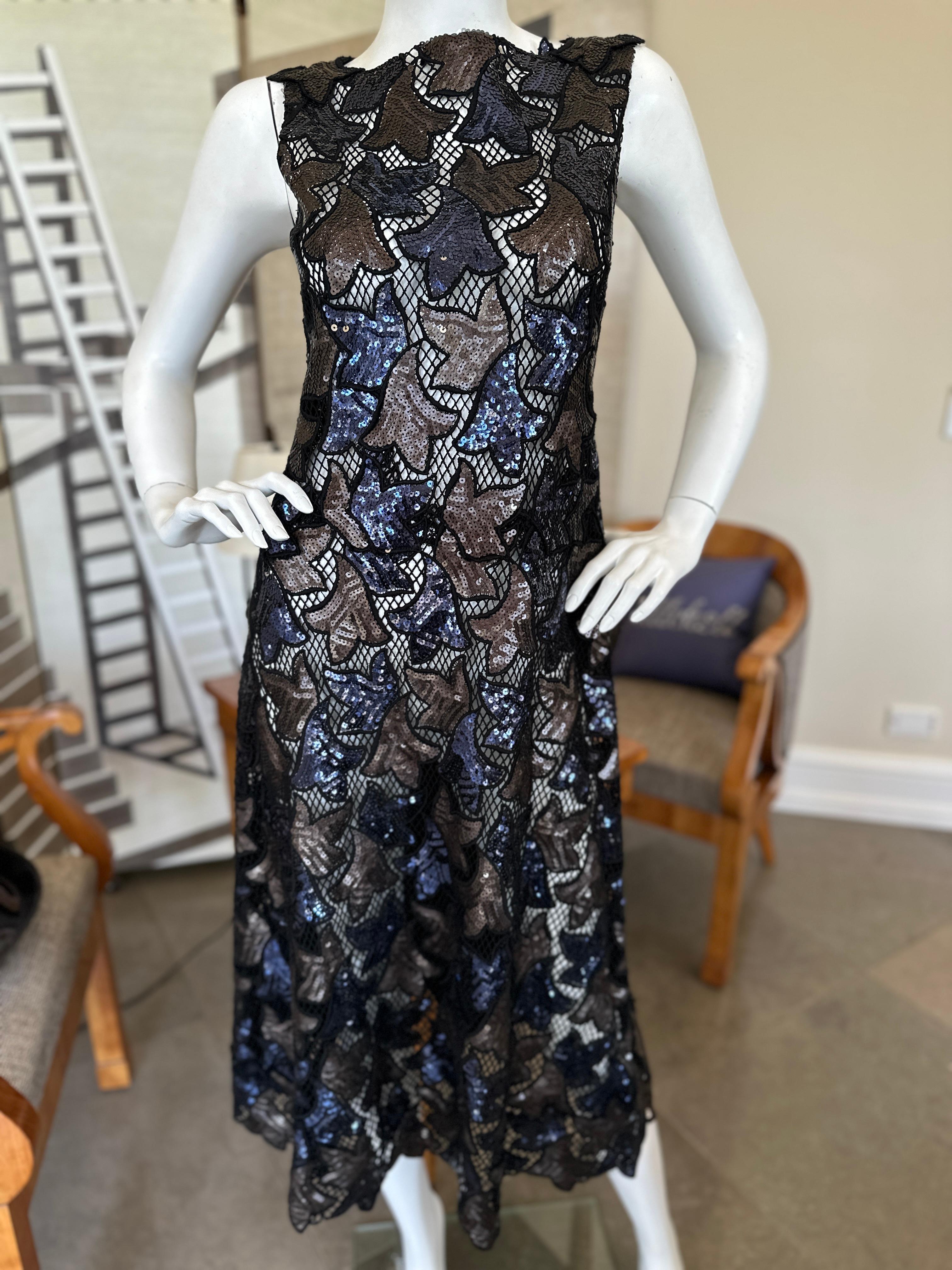 Marc Jacobs Collection Sheer Lace Dress with Sequin Leaves.
This is so pretty, please use the zoom feature to see the details. There is soutach details on the back.
Size 4
 Bust 36