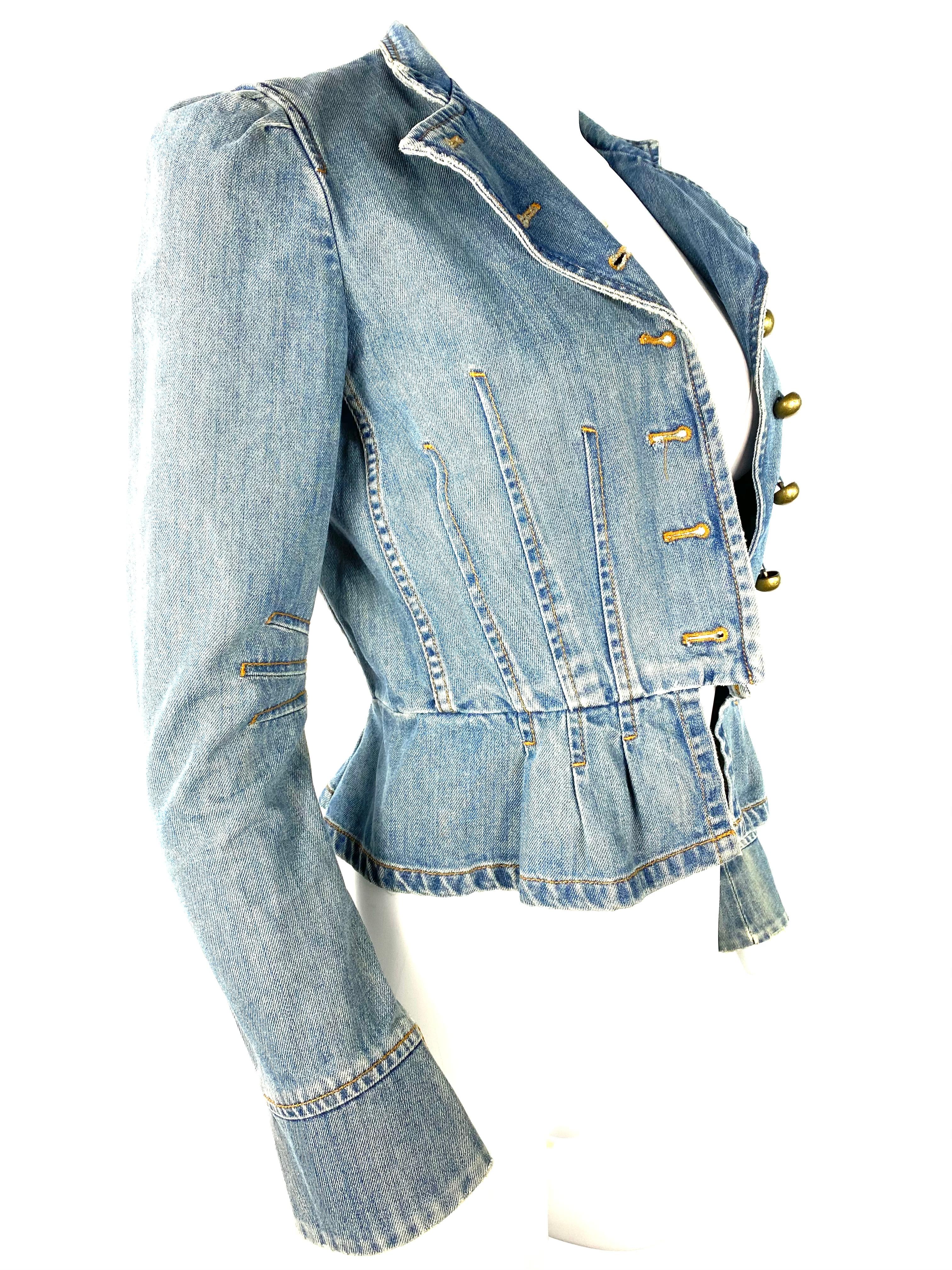 Product details:

Featuring blue light wash 100% cotton denim jacket with front seven gold tone ball button closure and flare detail on the bottom designed by Marc Jacobs.
