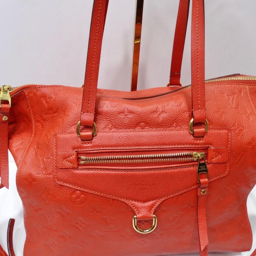 This red leather Louis Vuitton tote is the perfect every day handbag! From Marc Jacobs's 2012 Louis Vuitton collection, gorgeous cherry red calfskin leather comes together with signature Louis Vuitton gold hardware and a subtle iconic monogram to