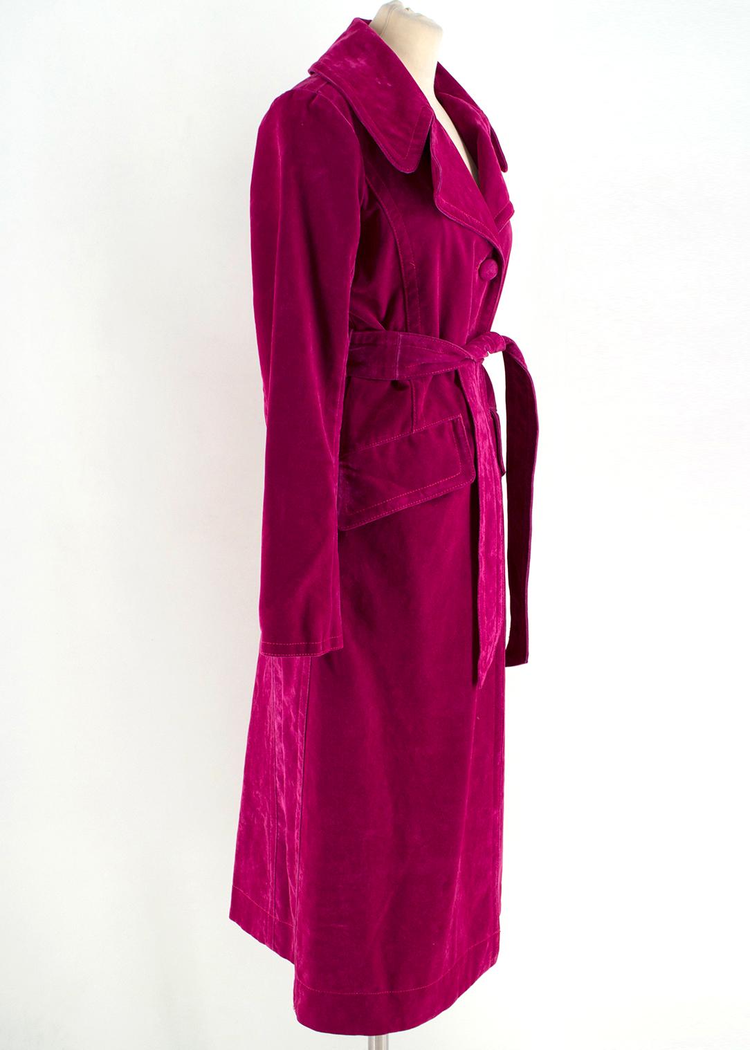 Marc Jacobs Fuchsia Long Velvet Trench Coat

- Fuchsia long velvet trench coat
- Heavy-weight
- Notch lapels
- Centre-front button fastening
- Front flap pockets
- Self-tie belt with belt loops
- Buttoned cuffs
- 69% cotton, 7% viscose and 24%