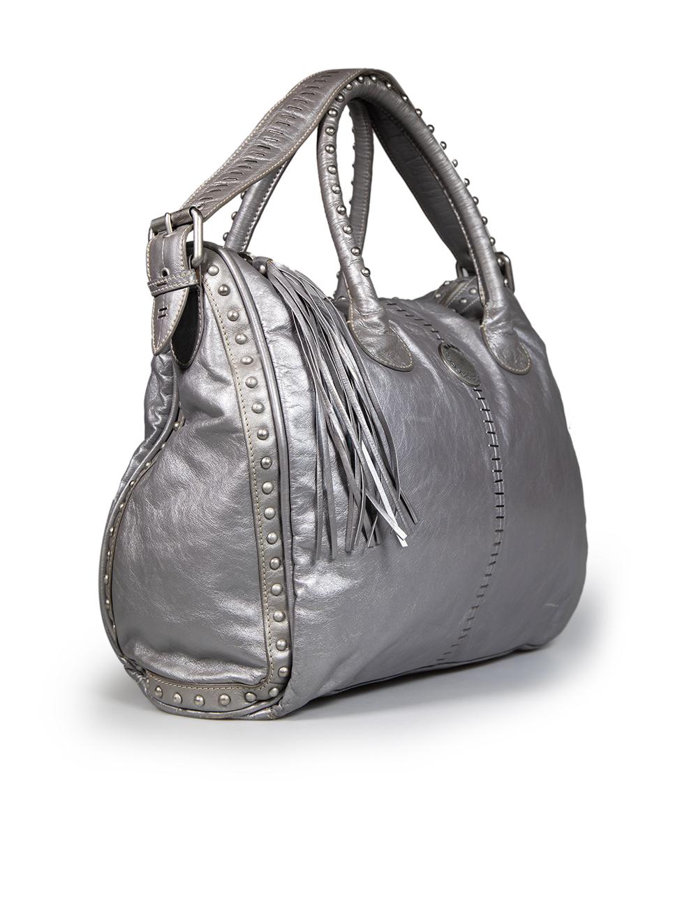CONDITION is Very good. Minimal wear to bag is evident. Minimal wear to the front, base, back and handles with creasing and some small abrasions. Tarnishing to metal hardware, glue marks to the top right side near the zip can be seen and there is a