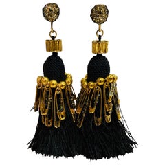 Marc Jacobs metal clip earrings and Swarovski crystals