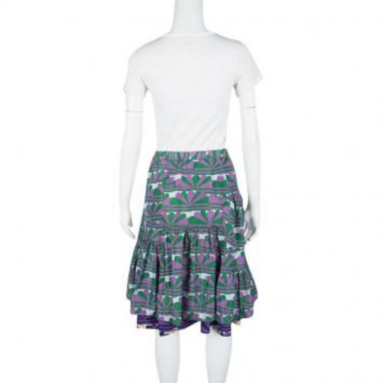 This skirt from Marc  Jacobs is sure to make your fall in love with it. The fabulous creation is designed with layers, ruffles at the bottom and prints in multiple colours splayed all over. You can pair this piece with a blouse and wedge sandals.