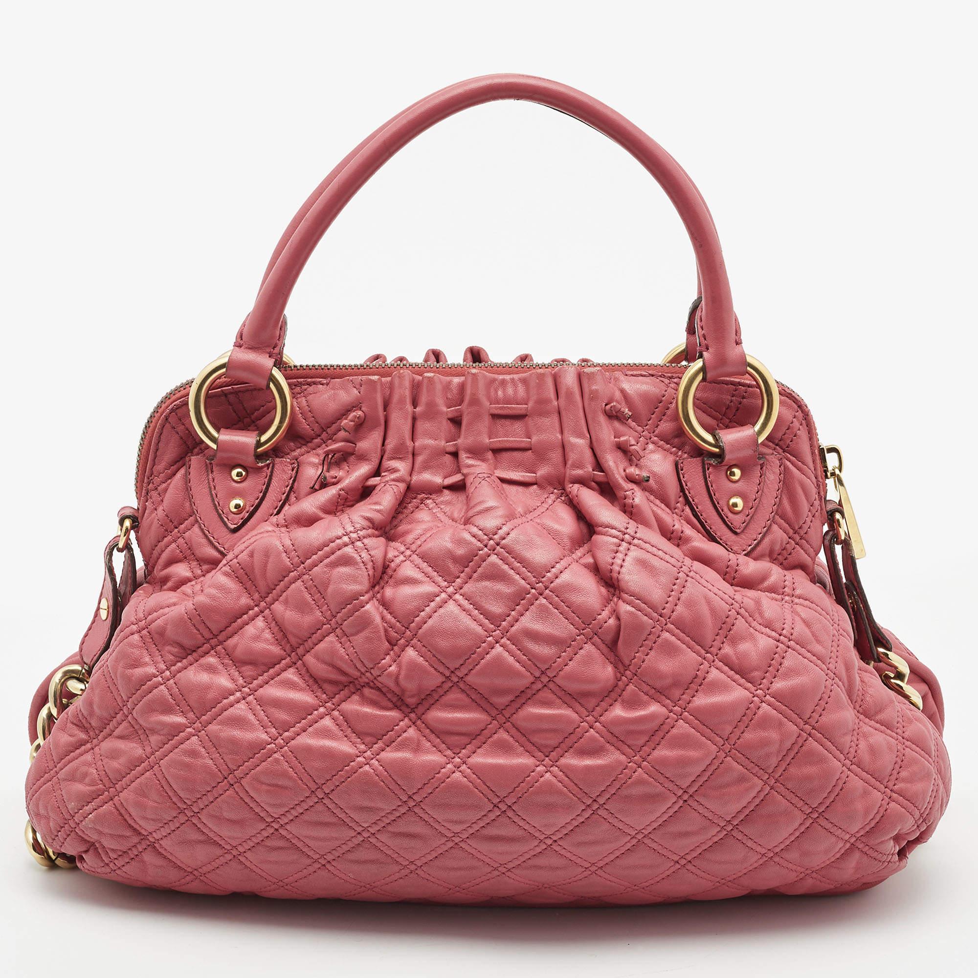 Handbags are more than just instruments to carry one's essentials. They tell a woman's sense of style, and the better the bag, the more confidence she gets when she holds it. This designer bag is meticulously made from luxe materials and has a