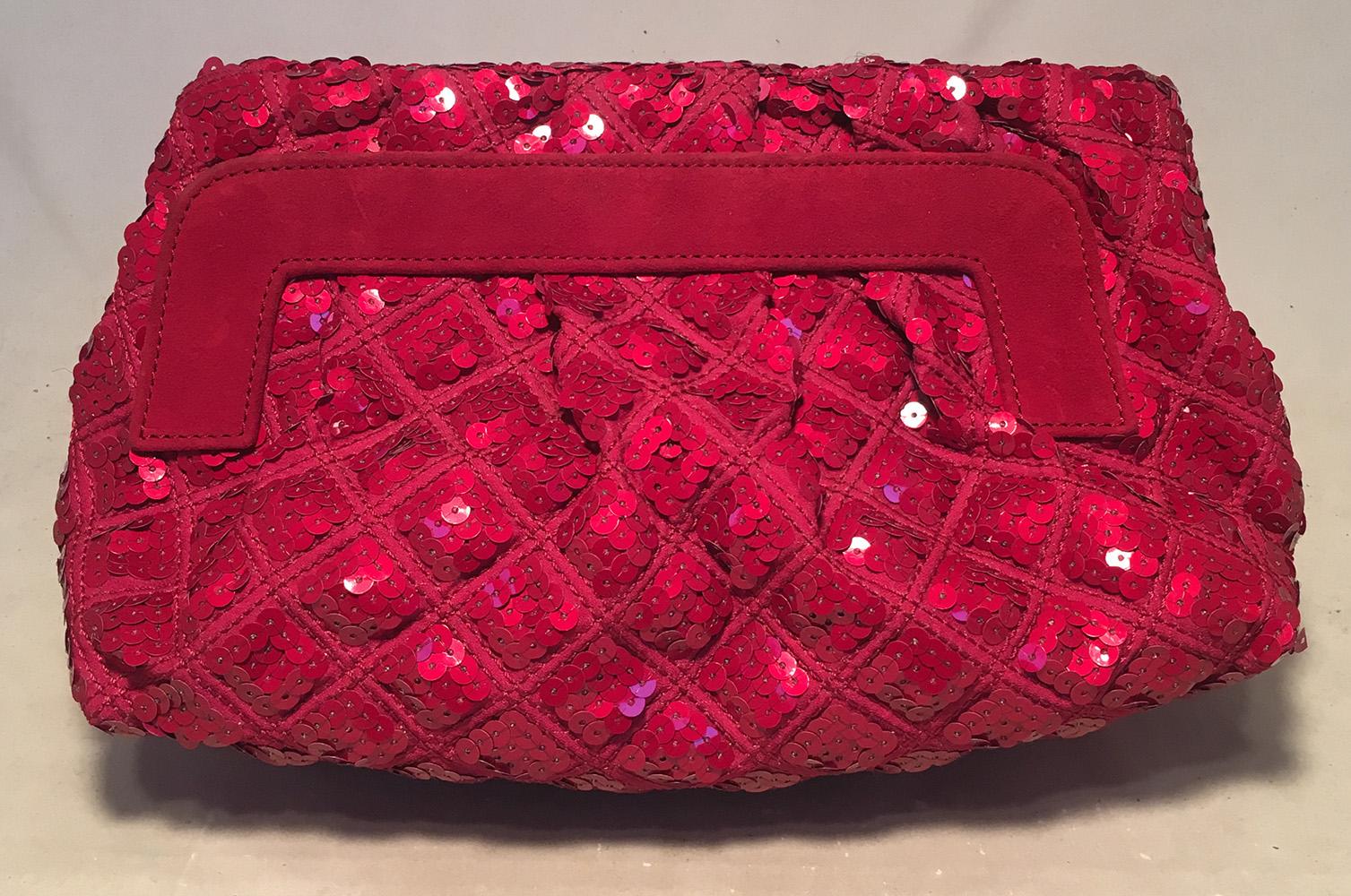 Marc Jacobs Pink Sequin Catherine Clutch Shoulder Bag in excellent condition. Dark pink quilted sequin exterior trimmed with matching pink suede and and gunmetal hardware. Small gunmetal frog detail along front side with pink sequin eyes. Top hinge