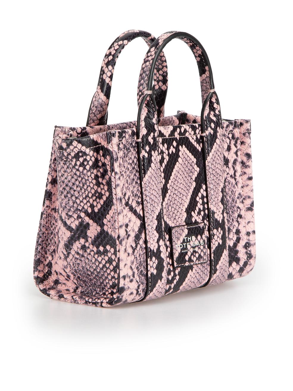 CONDITION is Very good. Hardly any visible wear to the bag is evident on this used Marc Jacobs designer resale item.
 
 
 
 Details
 
 
 The Tote Bag
 
 Pink
 
 Leather
 
 Mini crossbody bag
 
 Snakeskin embossed pattern
 
 2x Rolled top handles
 
