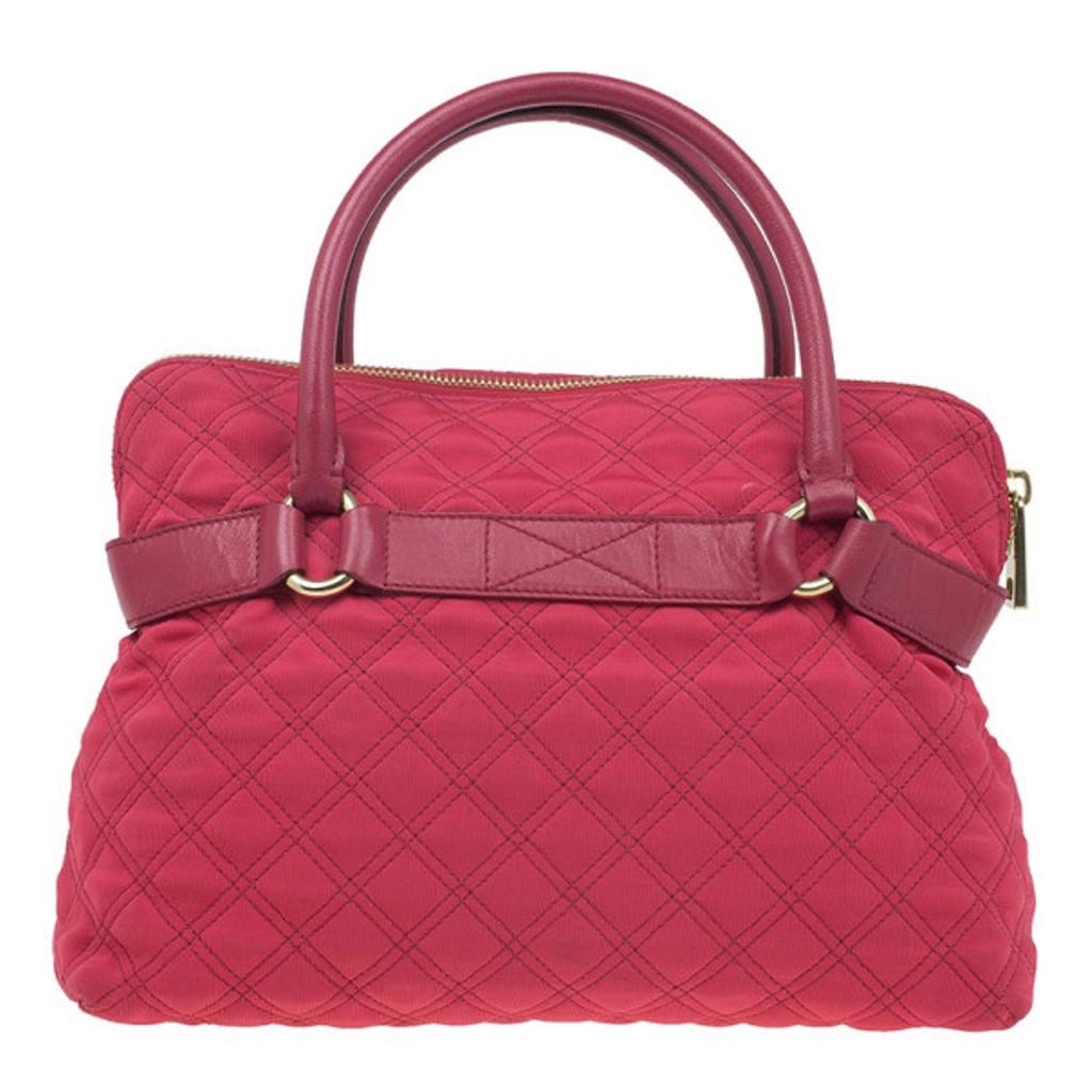 Make a fashion statement with this Marc Jacobs red quilted jersey satchel and turn heads everywhere. It features a cute Bruna bow in the front with silver-tone buckle and hardware detailing, and a cool quilted fabric exterior. It also has rolled