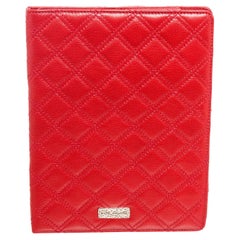 Marc Jacobs red tufted leather tablet case with silver-tone hardware, logo 