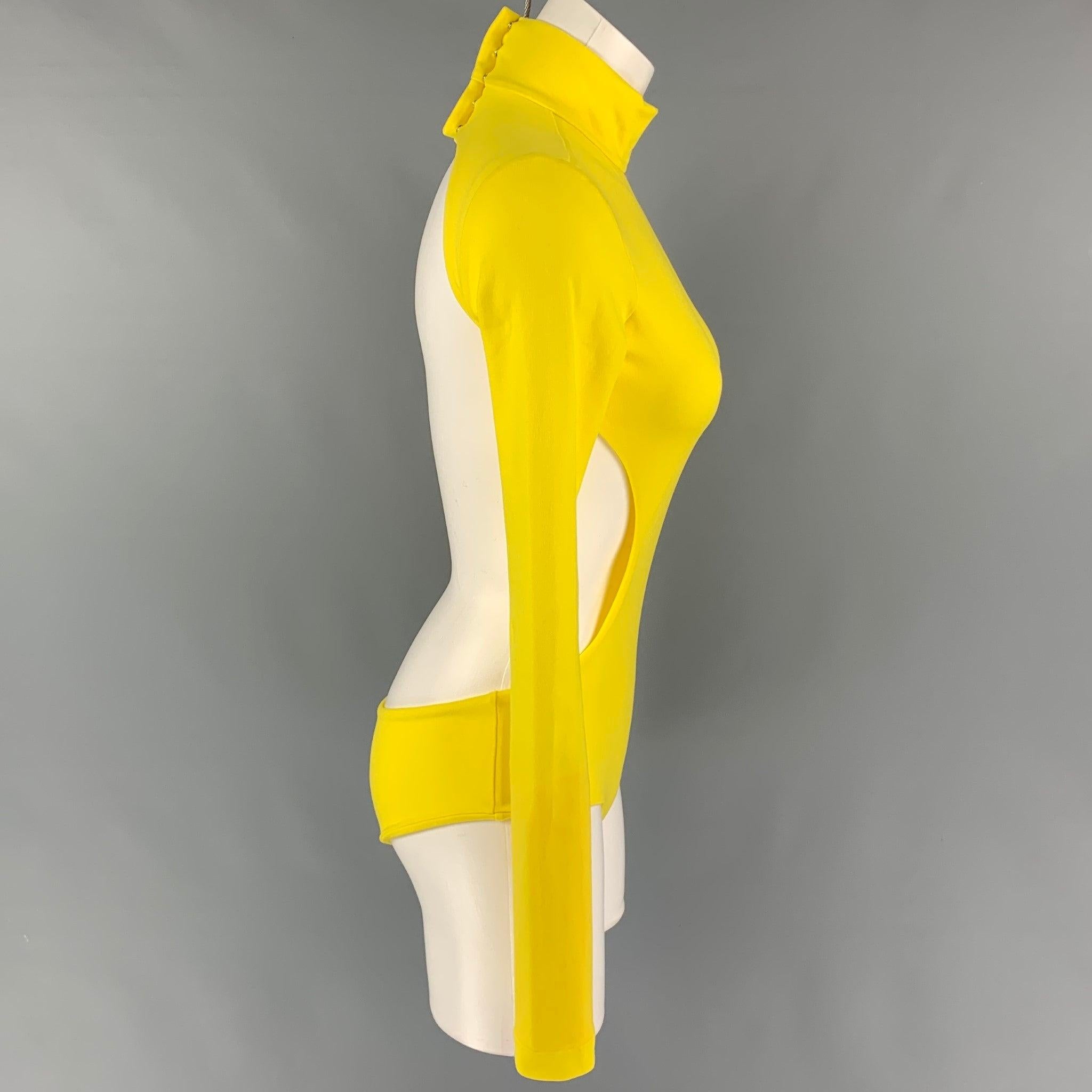 MARC JACOBS Runway 2021 body suit comes in a yellow polyester featuring a high neckline, long sleeves, waist cut-out, moderate seat coverage, and a snap button closure.
Very Good
Pre-Owned Condition. Light discoloration. As-is.  

Marked:   XS 