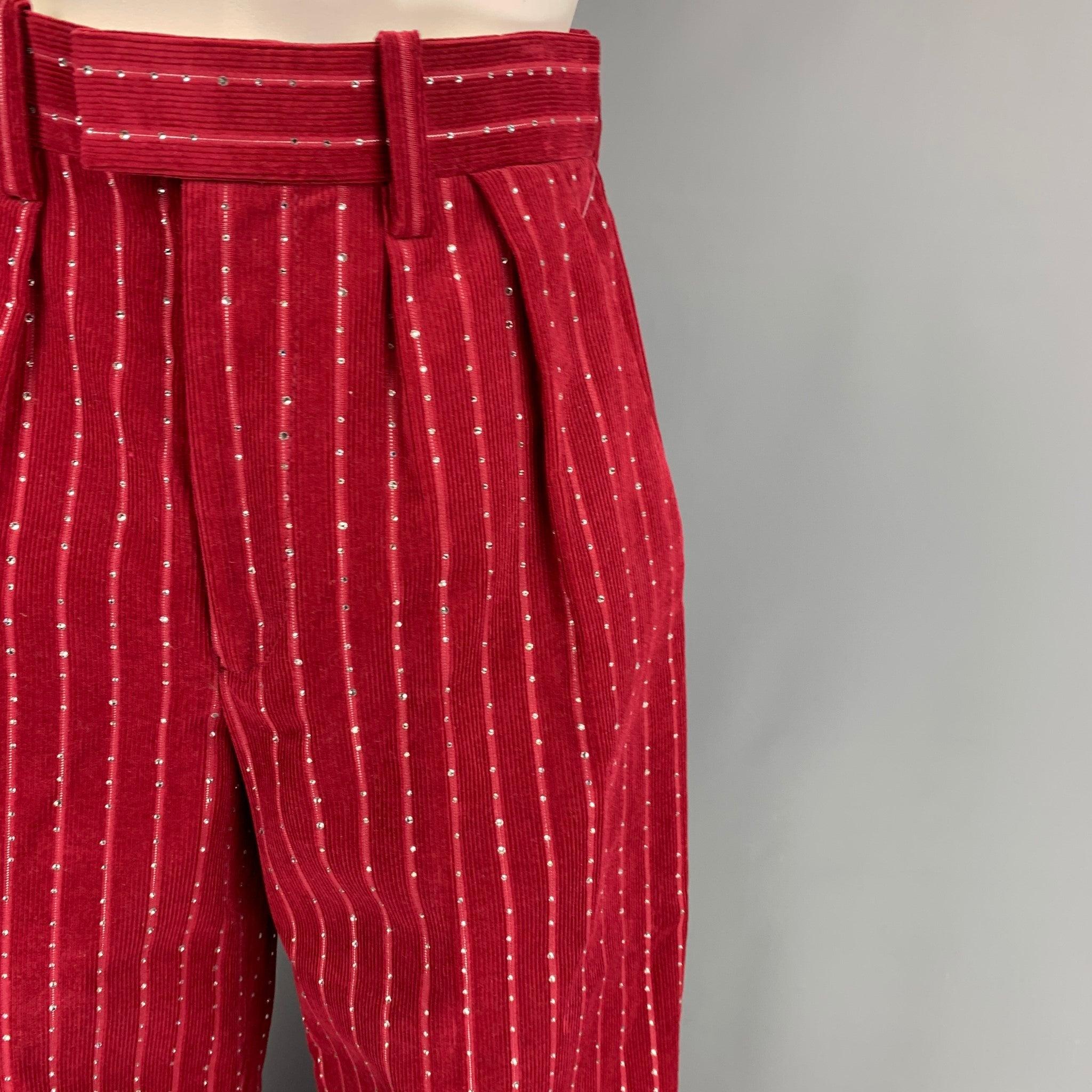 MARC JACOBS RUNWAY Spring 2020 pants comes in a burgundy corduroy cotton / lurex featuring crystal embellishment throughout, wide leg, pleated, and a zip fly closure.
Excellent
Pre-Owned Condition. 

Marked:   00 

Measurements: 
  Waist: 26 inches 