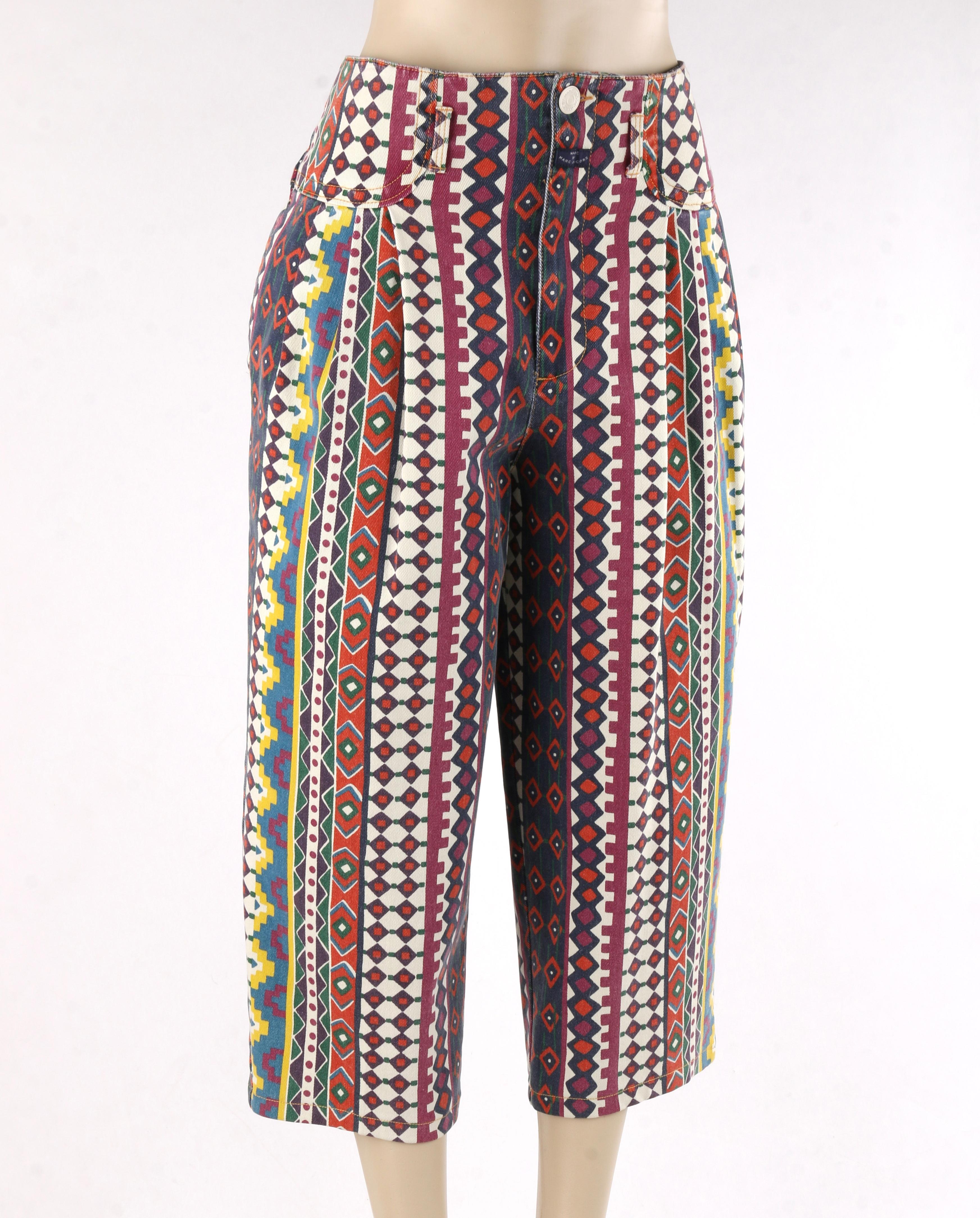 MARC JACOBS S/S 2010 Runway Burgeoning Tribal Printed Denim Crop Pant 
 
Brand / Manufacturer: Marc By Marc Jacobs
Collection: S/S 2010; runway look #9
Style: Clam digger pant
Color(s): Shades of red, yellow, green, blue, purple and white. 
Lined: