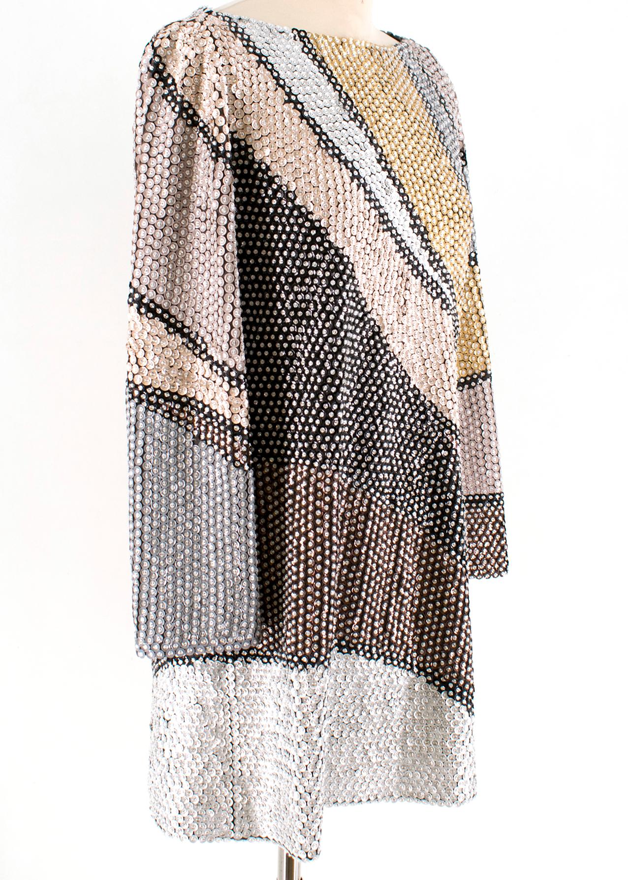 Marc Jacobs Sequin Studded Shift Dress 

Multicolour pattern sequin dress
Gold, brown, silver and black diagonal stripe design 
Long sleeves
Wide crew neck 
Brown interior lining 
Hidden zip fastening at the back centre of dress 
Loose fit 
Straight