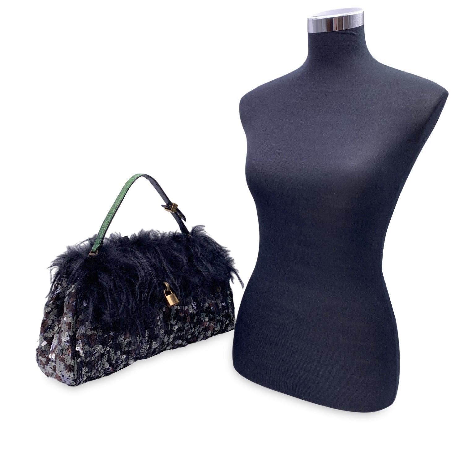 Beautiful Marc Jacobs 'Gilda' Fur and Sequins flap bag from the 2010 collection. Gold metal mock padlock detailing on the front. Flap with double magnetic button closure and push lock closure. Green leather top handles. Black leather lining. 1 side