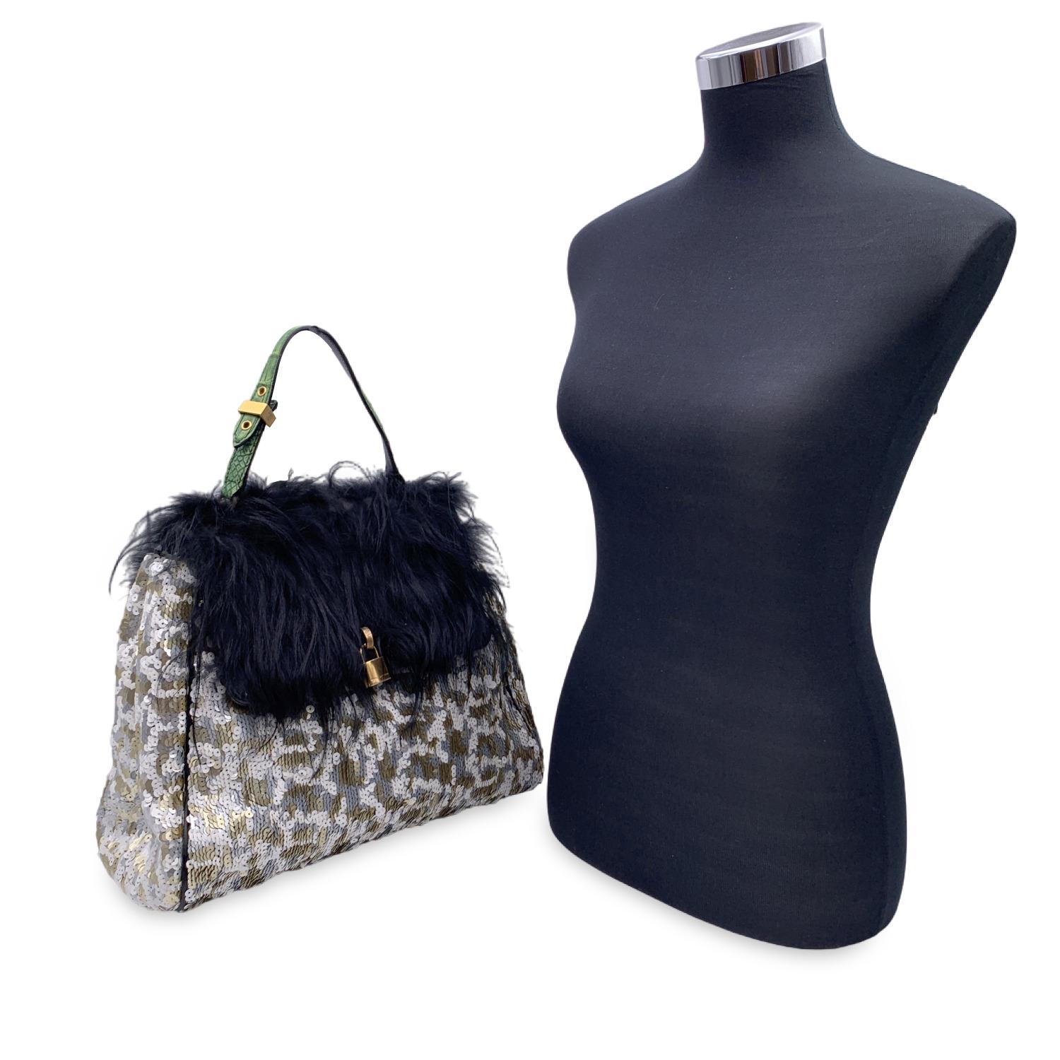 Beautiful Marc Jacobs 'Gilda' Fur and Sequins flap bag from the 2010 collection. Gold metal mock padlock detailing on the front. Flap with double magnetic button closure and push lock closure. Green leather top handles. Black leather lining. 1 side