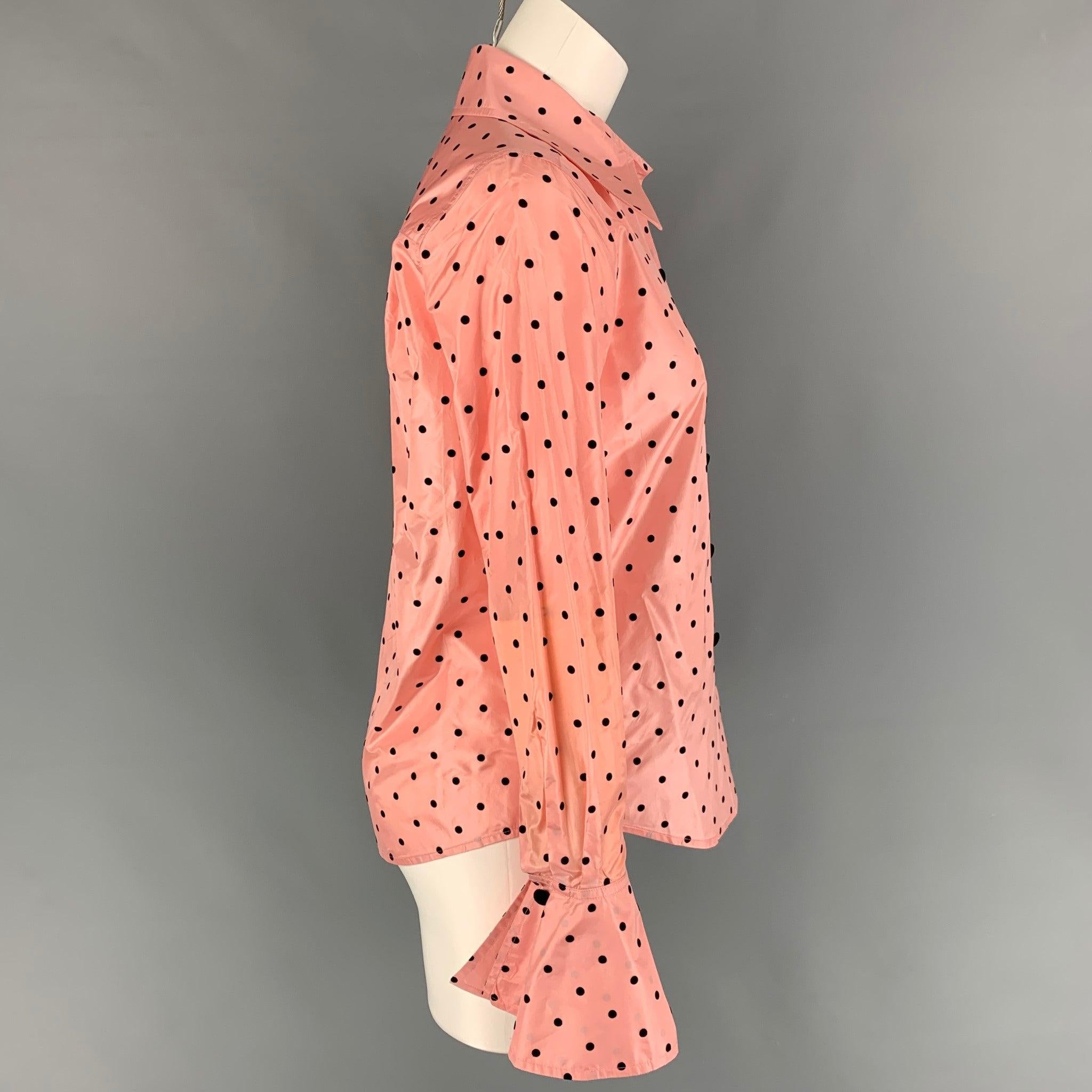 MARC JACOBS shirt comes in a pink & black polka dot silk featuring a pointed collar, french cuffs, and a buttoned closure.
Good Pre-Owned Condition. Minor marks at back. 

Marked:   0 

Measurements: 
 
Shoulder: 14.5 inches  Bust: 36 inches 