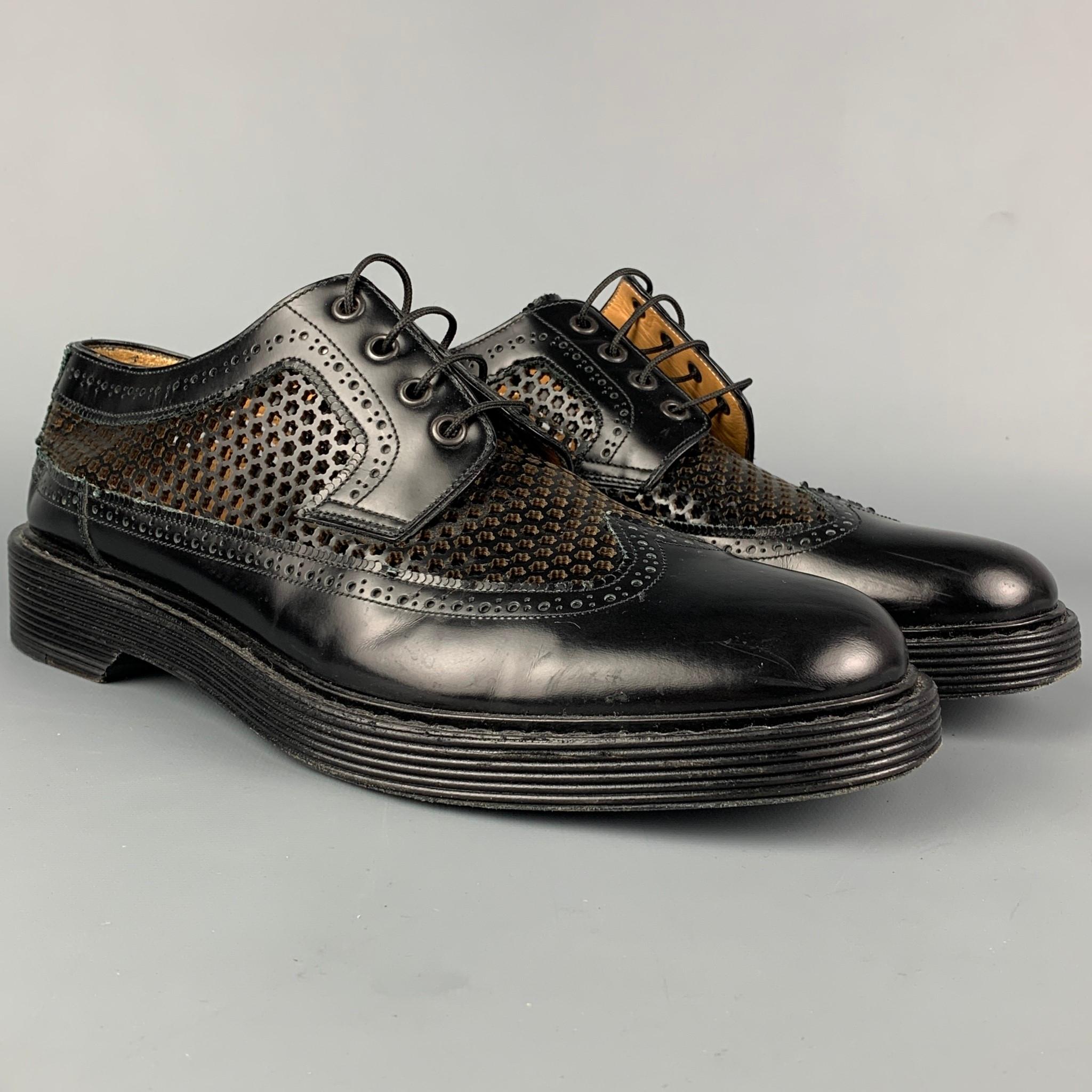 MARC JACOBS shoes comes in a black perforated leather featuring a wingtip style and a lace up closure. Made in Italy. 

Very Good Pre-Owned Condition.
Marked: 43/9
 
Outsole: 12.5 in. x 4.5 in. 