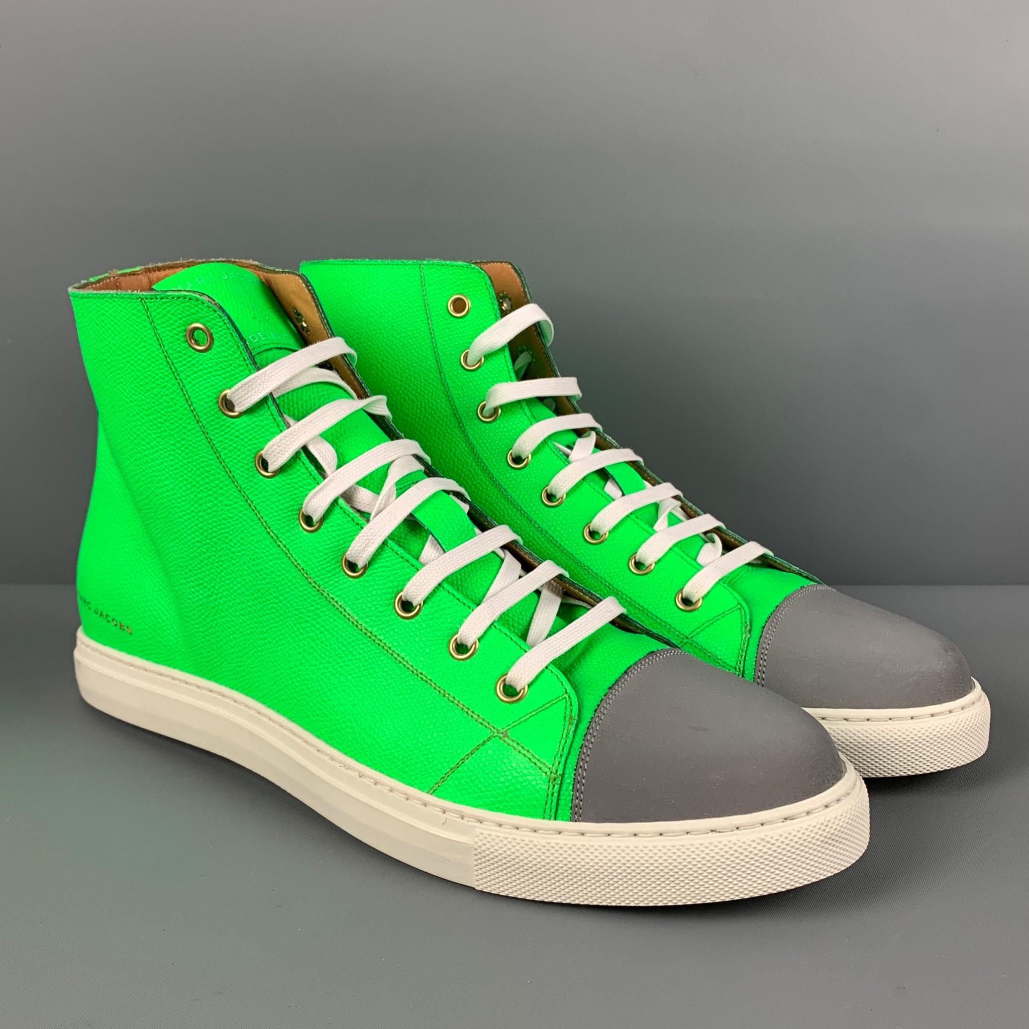 MARC JACOBS shoes comes in a green & grey color color block leather featuring a high-top style, contrast stitching, and a lace up closure. Made in Italy.

Very Good Pre-Owned Condition.
Marked: 9-43

Outsole: 12 in. x 4 in. 