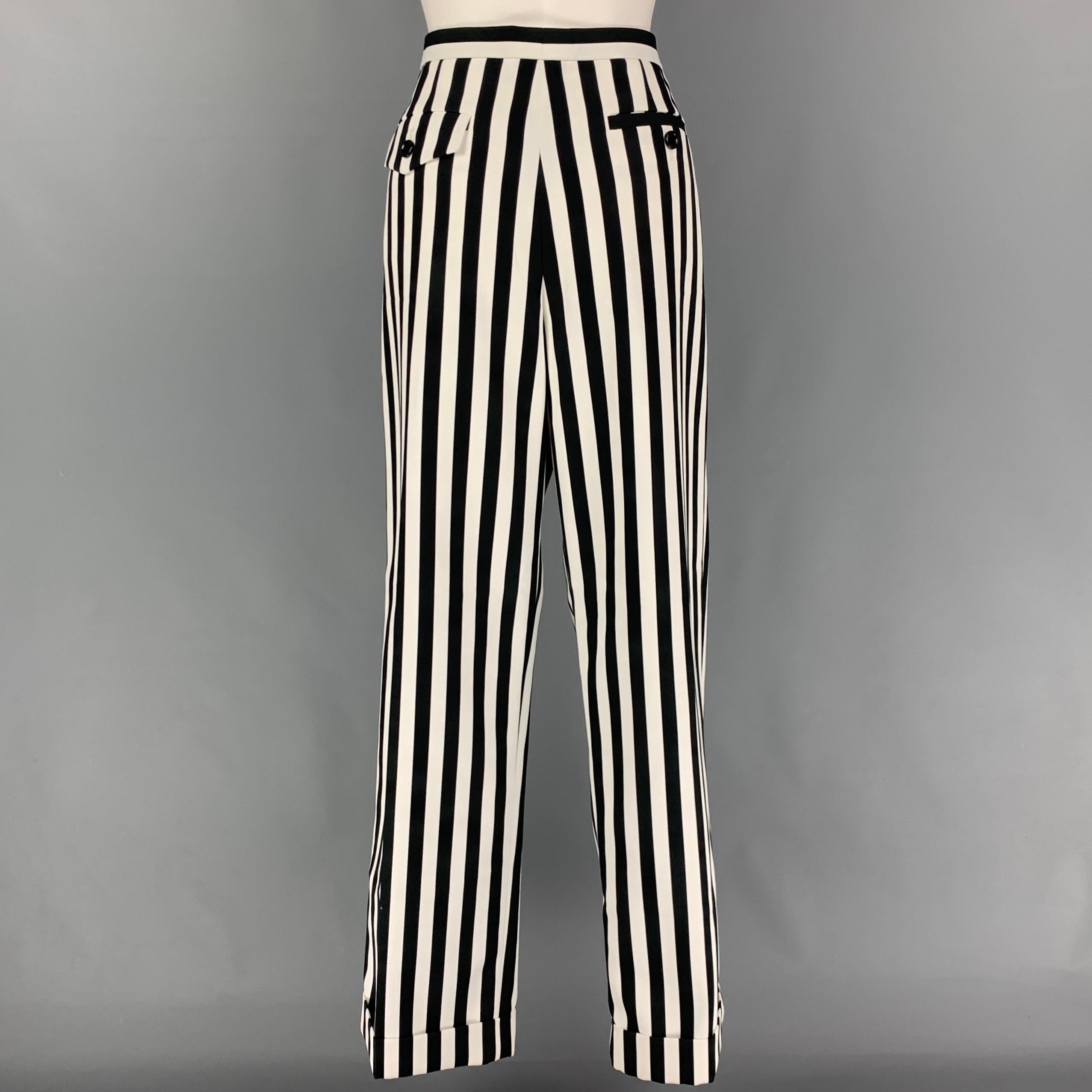 MARC JACOBS dress pants comes in a black & white stripe polyester with a silk liner featuring a wide leg style, cuffed leg, front tab, and a zip fly closure. Made in USA.

New With Tags.
Marked: 12
Original Retail Price: