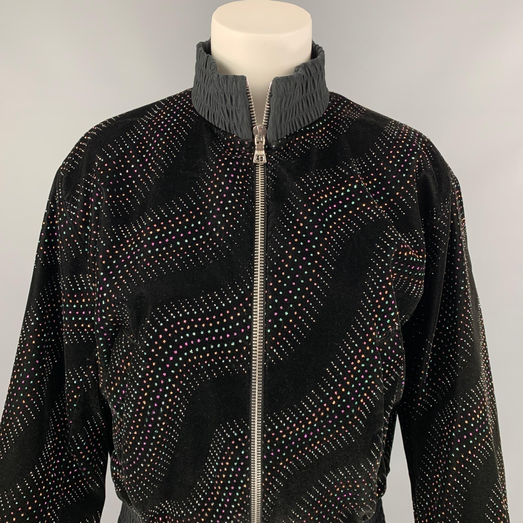 MARC JACOBS jacket comes in a black acetate blend featuring rhinestone details throughout, ribbed hem, high collar, and a zip up closure. Made in USA. 

Very Good Pre-Owned Condition.
Marked: 2

Measurements:

Shoulder: 17 in.
Bust: 40 in.
Sleeve: