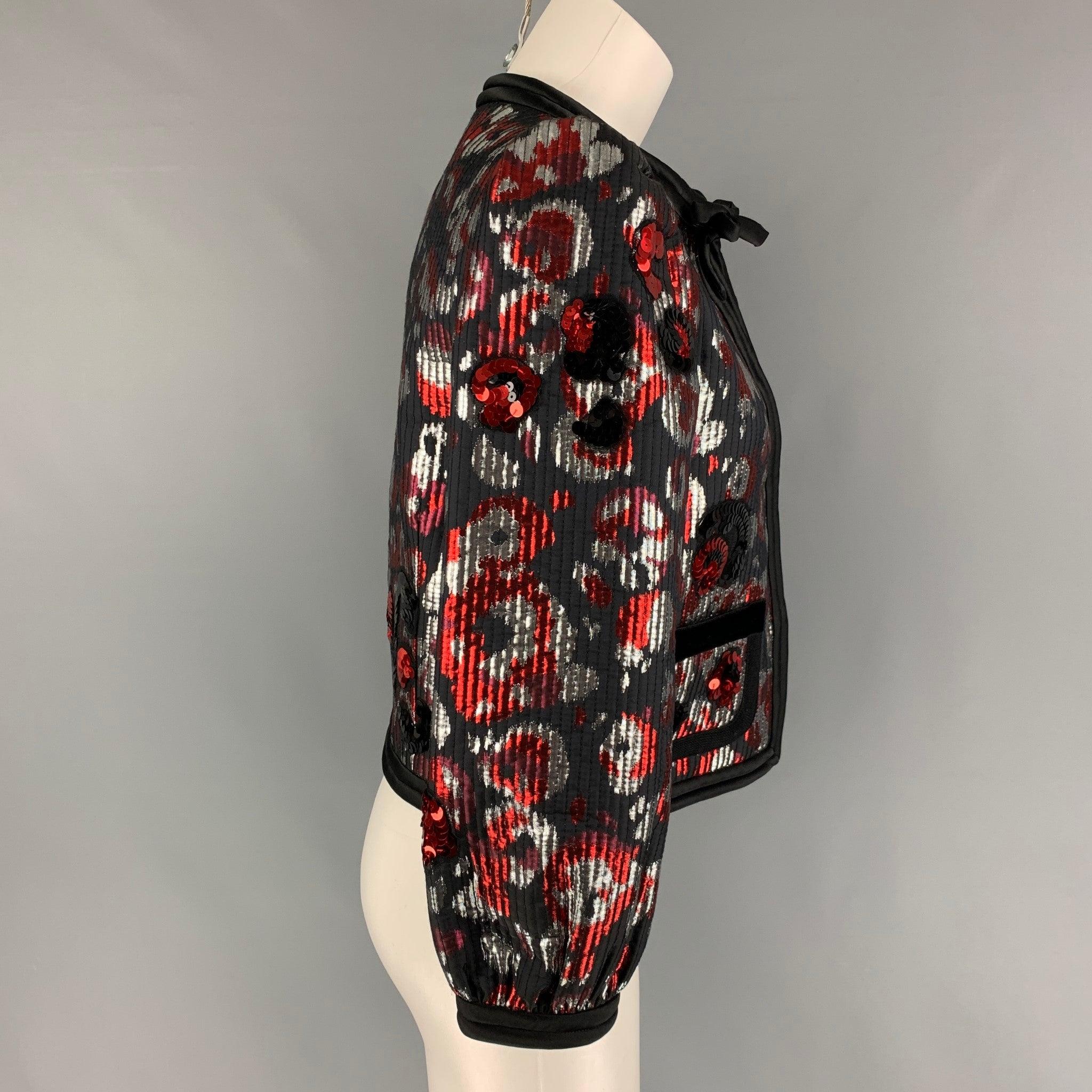 MARC JACOBS jacket comes in a black & red polyester featuring a cropped style, sequin details, front bow, front pockets, and a hook & loop closure.
Very Good
Pre-Owned Condition. 

Marked:   2 

Measurements: 
 
Shoulder: 13.5 inches  Bust: 35
