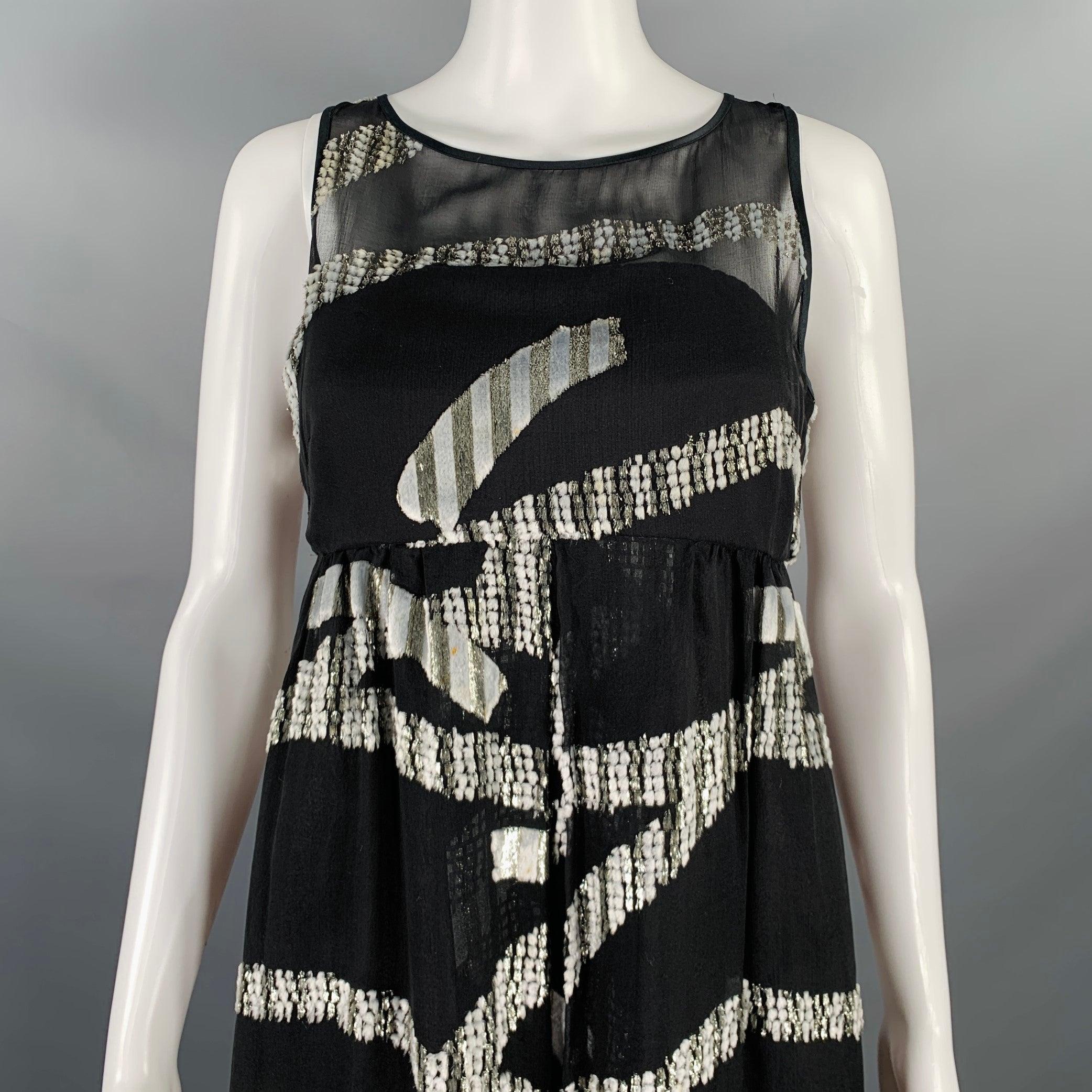 MARC JACOBS dress
in a black and silver tone silk blend fabric featuring a sleeveless empire style, abstract jacquard design, built-in bra with back zipper closure, and back button closure.Very Good Pre-Owned Condition. Moderate marks, please check