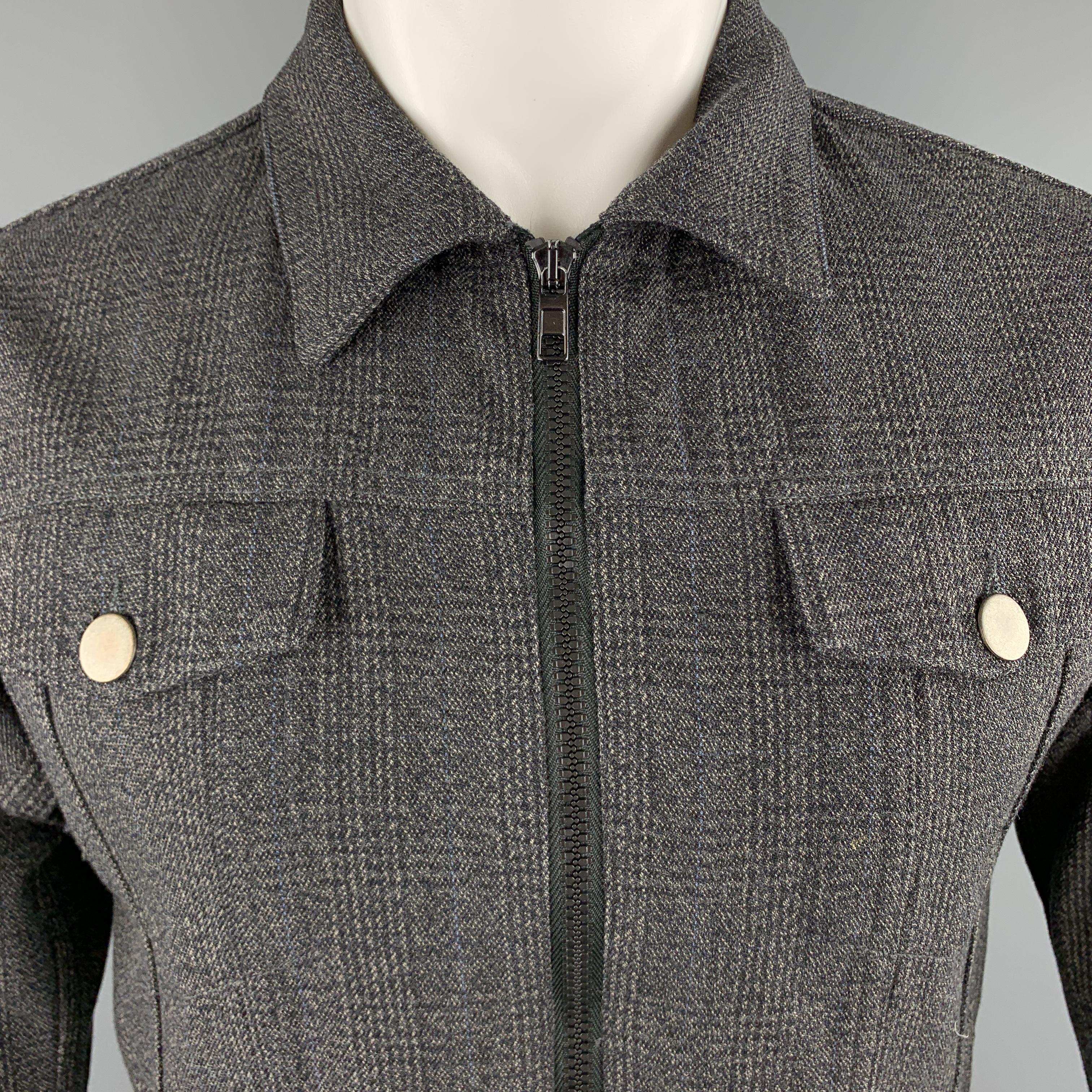MARC JACOBS trucker jacket comes in gray glenplaid woven yack material with a pointed collar, flap pockets, and zip front. Made in Italy.

Excellent Pre-Owned Condition.
Marked: IT 46

Measurements:

Shoulder: 15 in.
Chest: 40 in.
Sleeve: 26