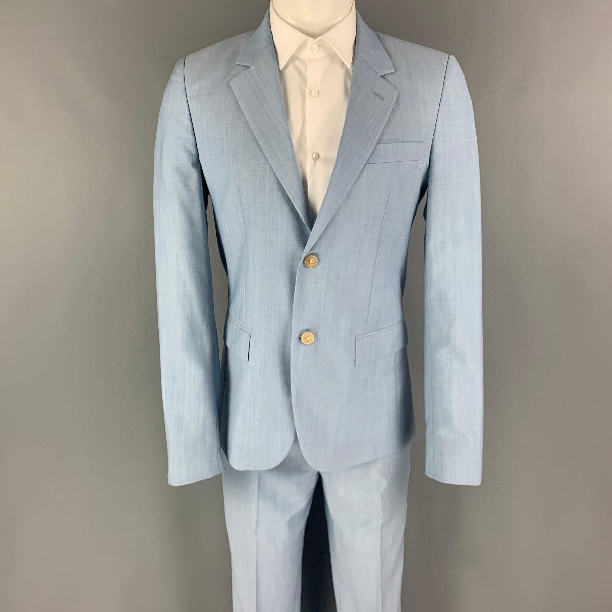 MARC JACOBS
suit comes in a light blue wool with a full liner and includes a single breasted, double button sport coat with notch lapel and matching flat front trousers. Made in Italy. Excellent Pre-Owned Condition. 

Marked:   48 

Measurements: 
 