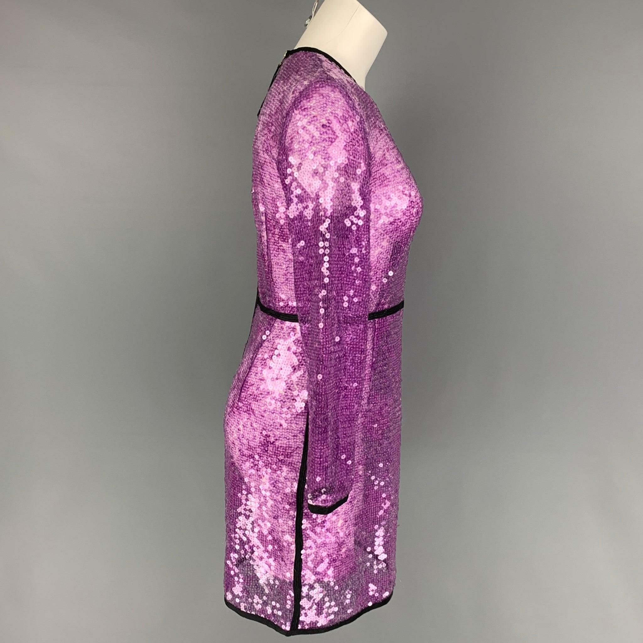 MARC JACOBS dress comes in a purple sequin material with a black trim featuring a shift style, long sleeves, and a back zip up closure.
Very Good
Pre-Owned Condition. 

Marked:   4 

Measurements: 
 
Shoulder: 16 inches  Bust: 32 inches  Waist: 27