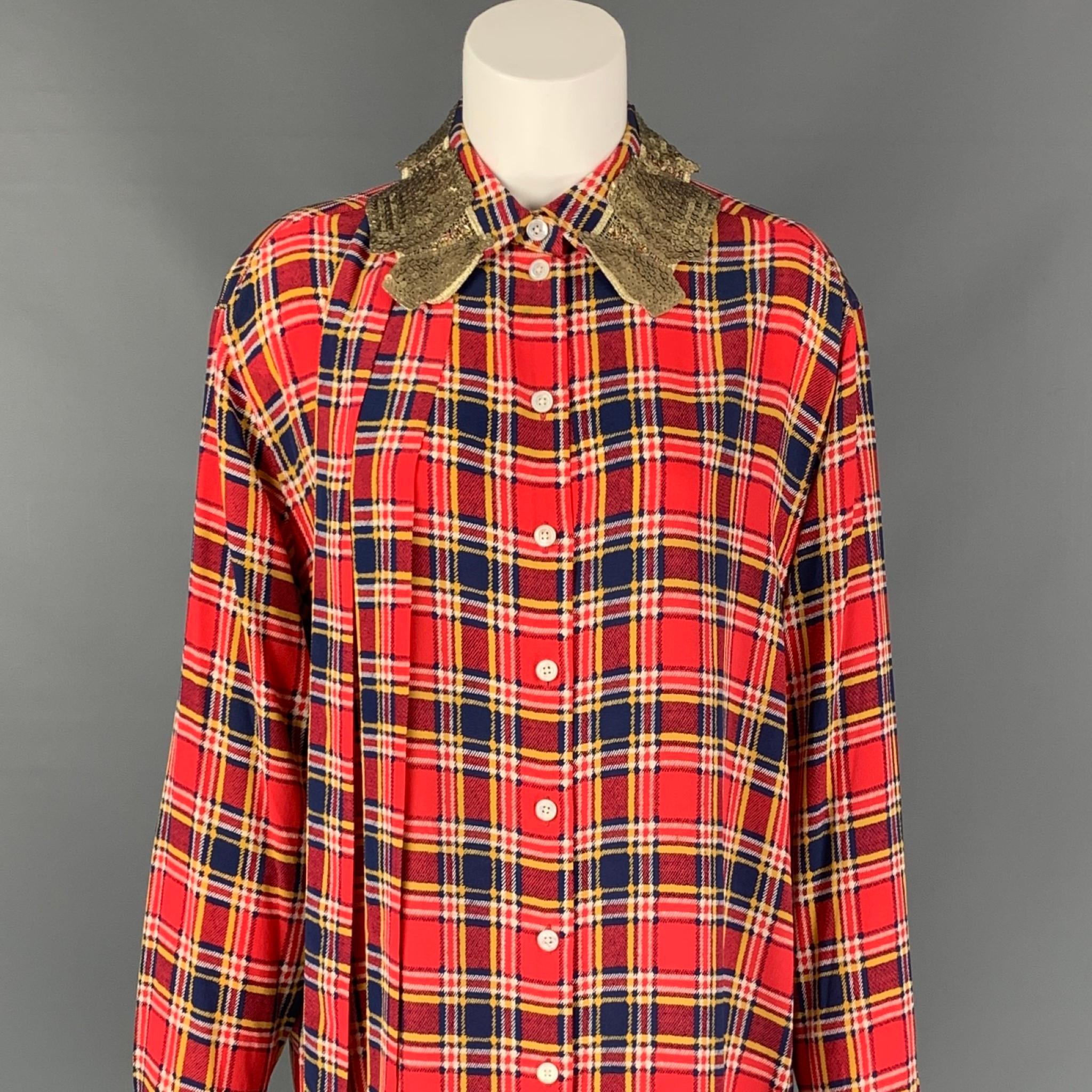 MARC JACOBS long shirt comes in a red & blue plaid silk featuring a loose fit, front bow design, sequined collar, and a buttoned closure. 

Excellent Pre-Owned Condition.
Marked: 4

Measurements:

Shoulder: 18.5 in.
Bust: 44 in.
Sleeve: 25