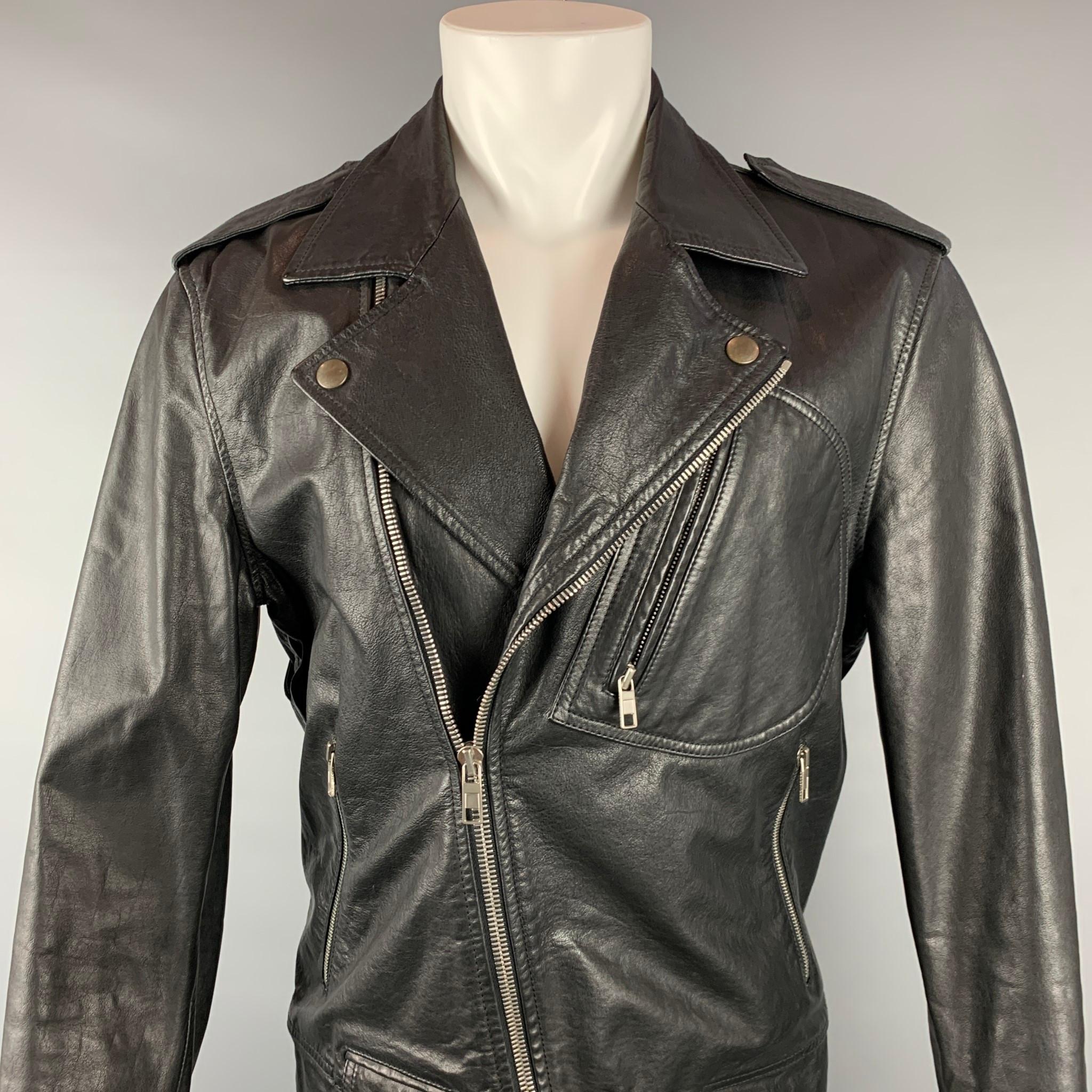 MARC JACOBS jacket comes in a black leather with a full liner featuring a biker style, front zipper pockets, epaulettes, and a zip up closure. Made in Italy.

Very Good Pre-Owned Condition.
Marked: IT 50

Measurements:

Shoulder: 19 in.
Chest: 40
