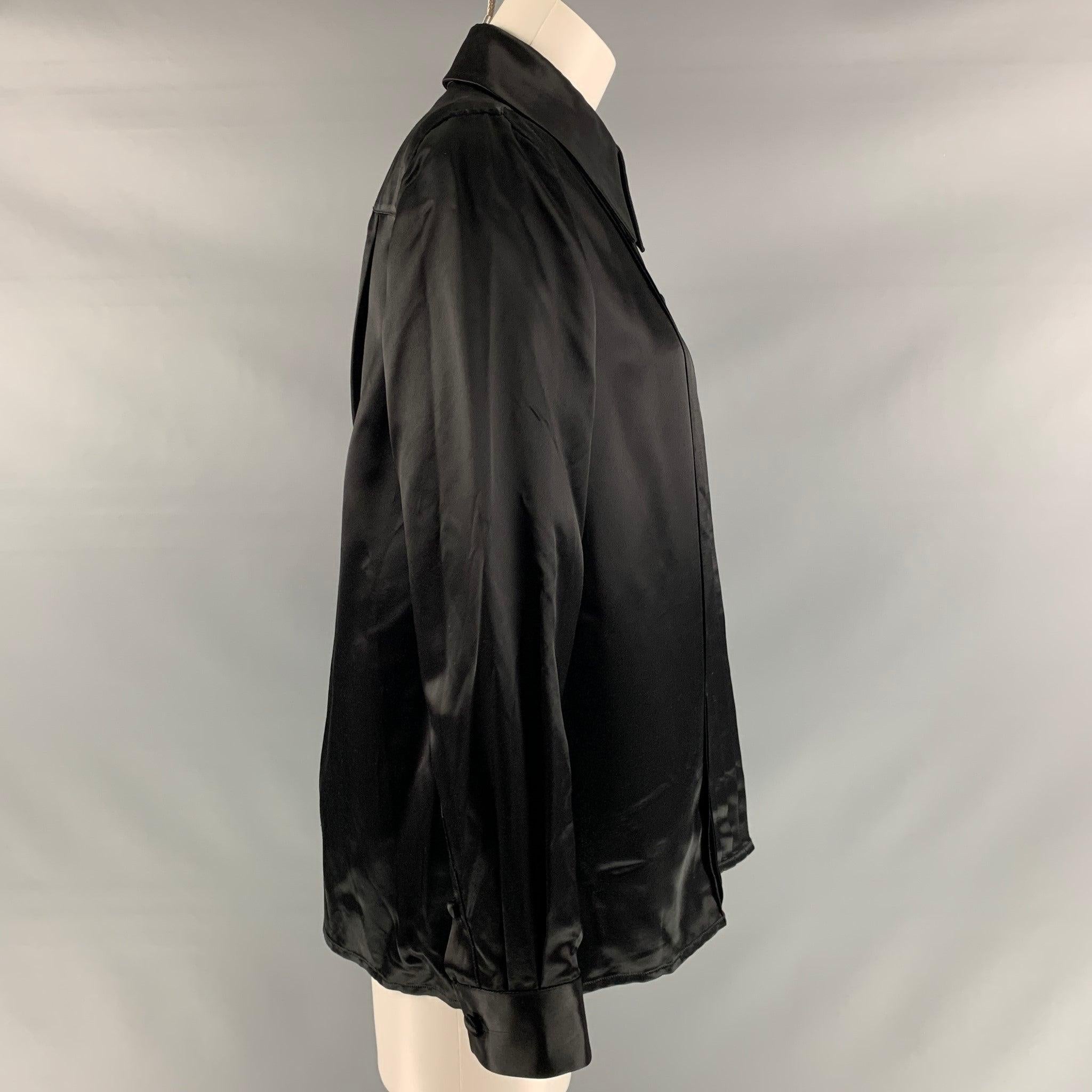 MARC JACOBS Runway Spring 2019 long sleeve shirt comes in black viscose sateen fabric featuring pleated (tuxedo) detail at front and button up closure. Made in USA.Excellent Pre-Owned Condition. 

Marked:   6 

Measurements: 
 
Shoulder: 16 inches