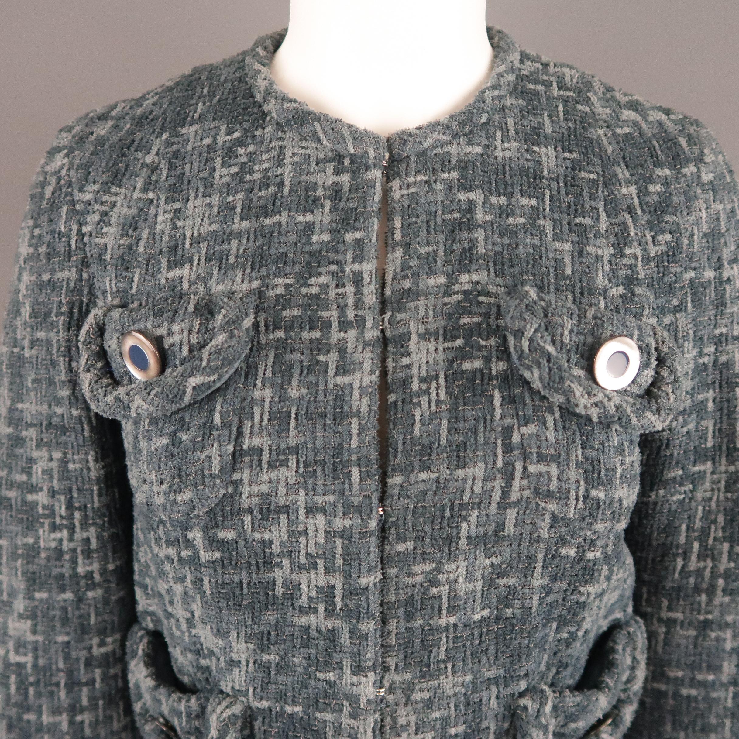 MARC JACOBS jacket comes in blue cotton blend tweed with a round, collarless neckline, hook eye closures, and open flap patch pockets with button detail. Made in USA.
 
Excellent Pre-Owned Condition.
Marked: 6
 
Measurements:
 
Shoulder: 14