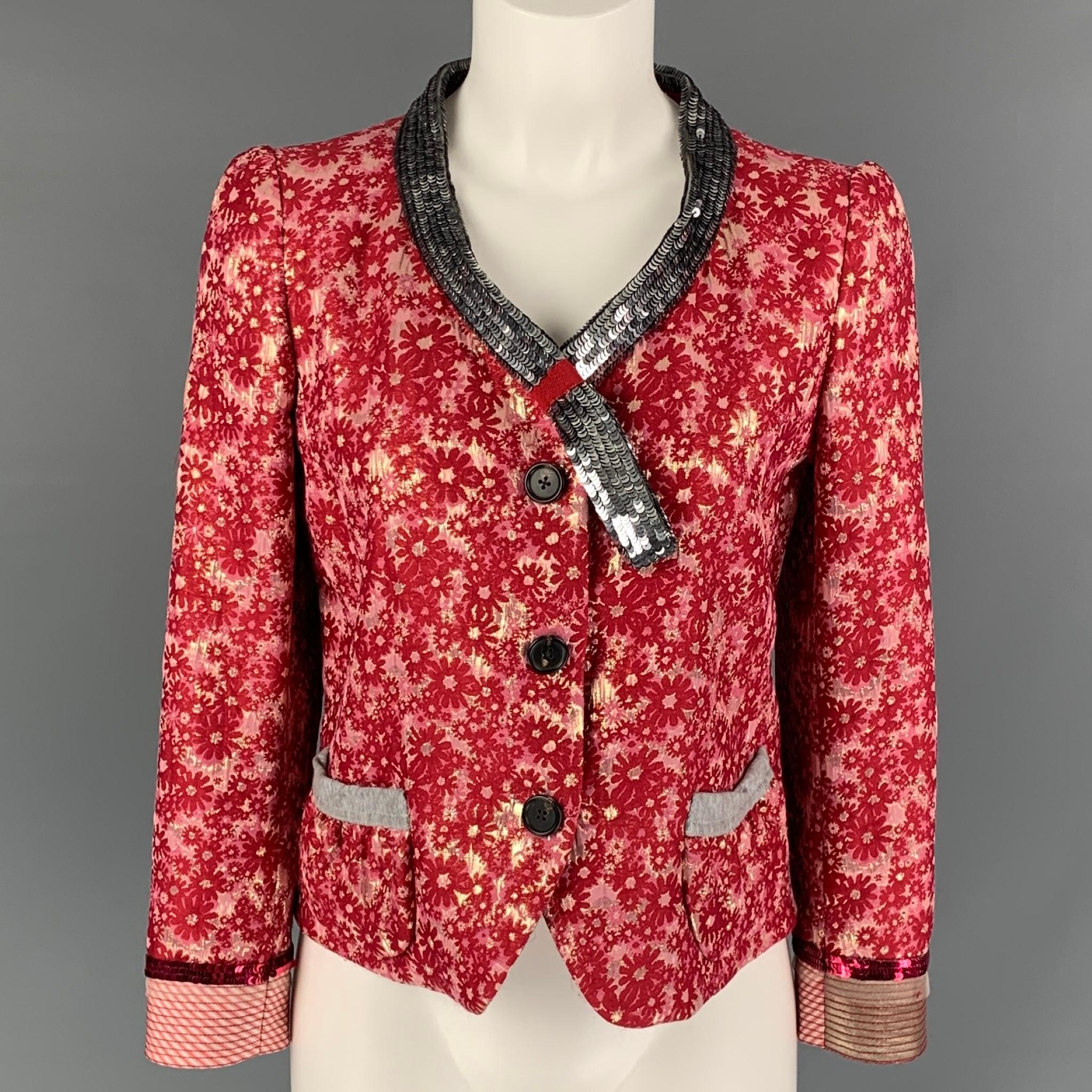MARC JACOBS blazer comes in raspberry and silver floral acetate blend jacquard featuring sequins trim details, two frontal pockets, and contrast top stitches. Made in USA.

Excellent Pre-Owned Condition.
Marked: 6

Measurements:

Shoulder: 14